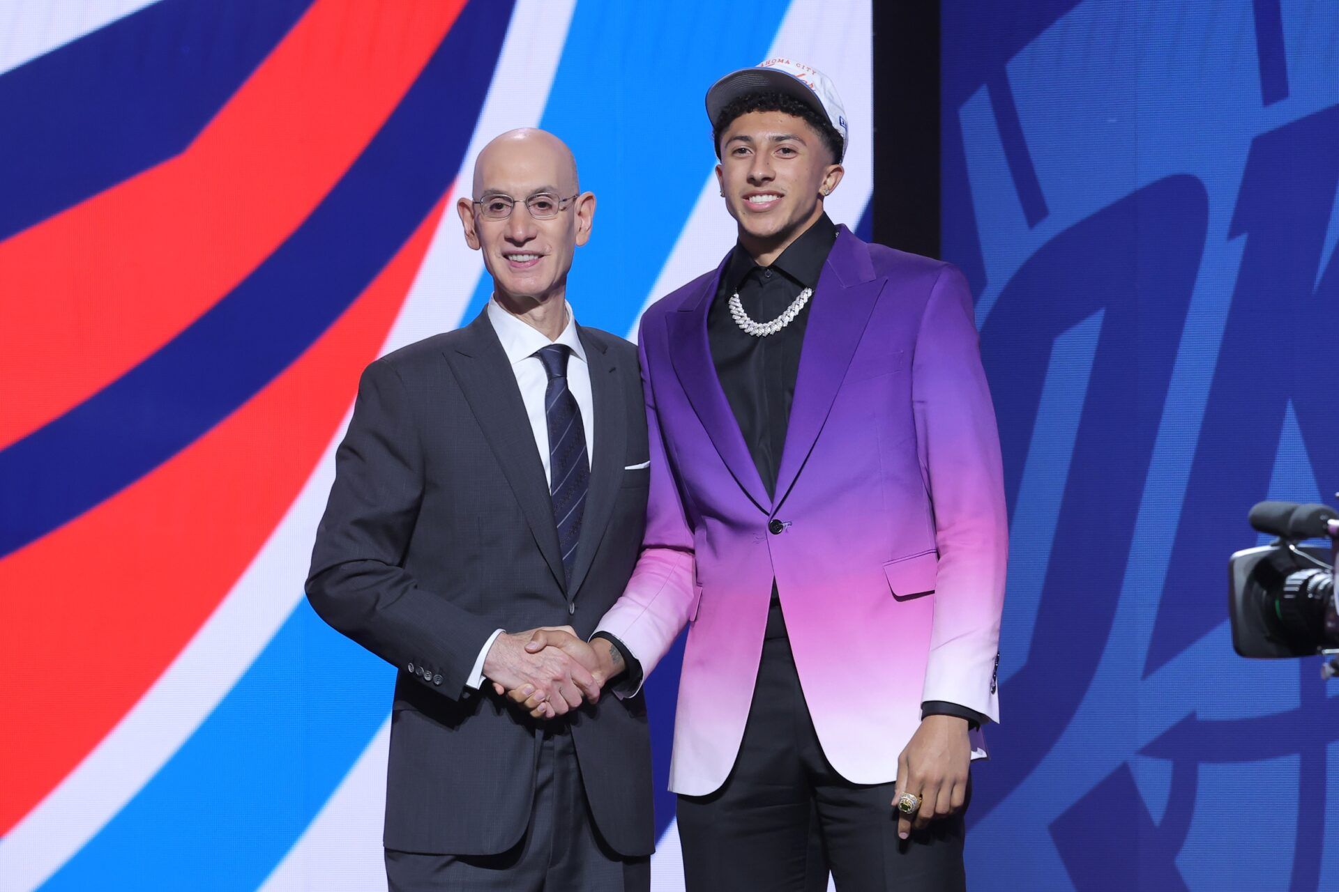 Nique Clifford stands with NBA commissioner Adam Silver after being selected as the 24th pick by the Oklahoma City Thunder in the first round of the 2025 NBA Draft at Barclays Center.
