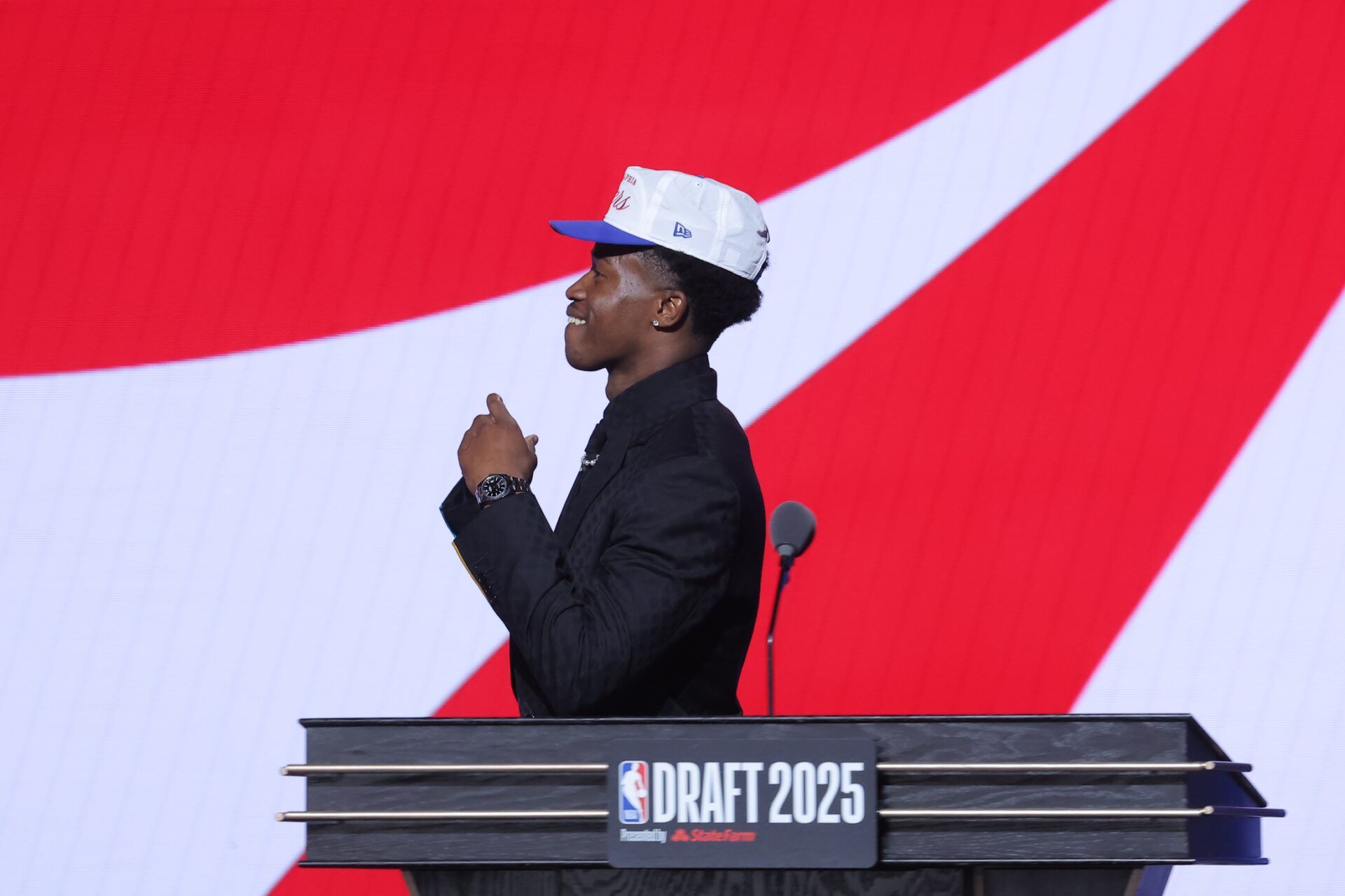 VJ Edgecombe reacts on stage after being selected as the third pick by the Philadelphia 76ers in the first round of the 2025 NBA Draft at Barclays Center.