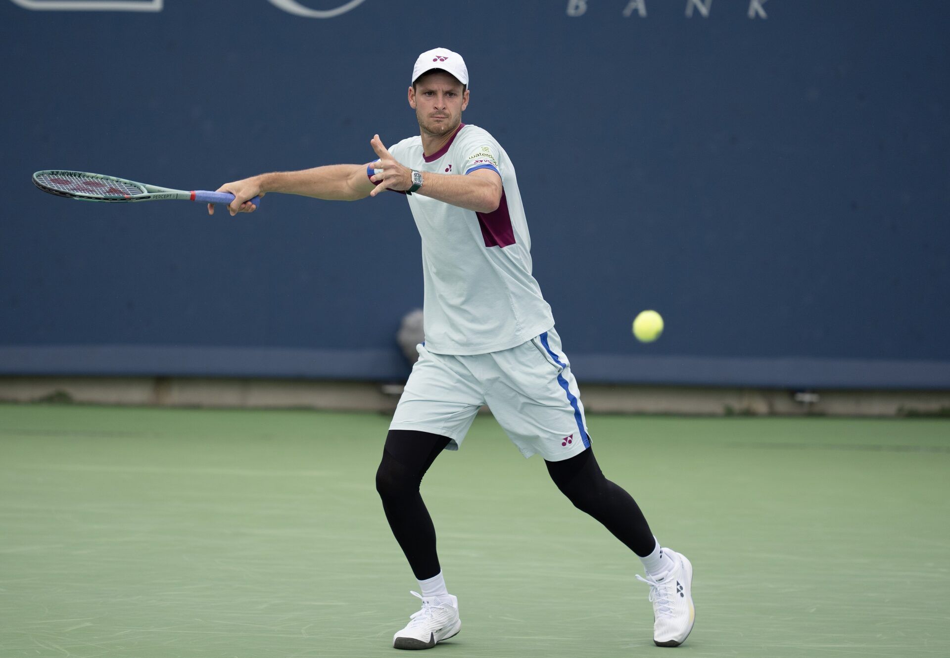 Hubert Hurkacz of Poland returns a shot during his match against Flavio Cobolli of Italy on day five of the Cincinnati Open.