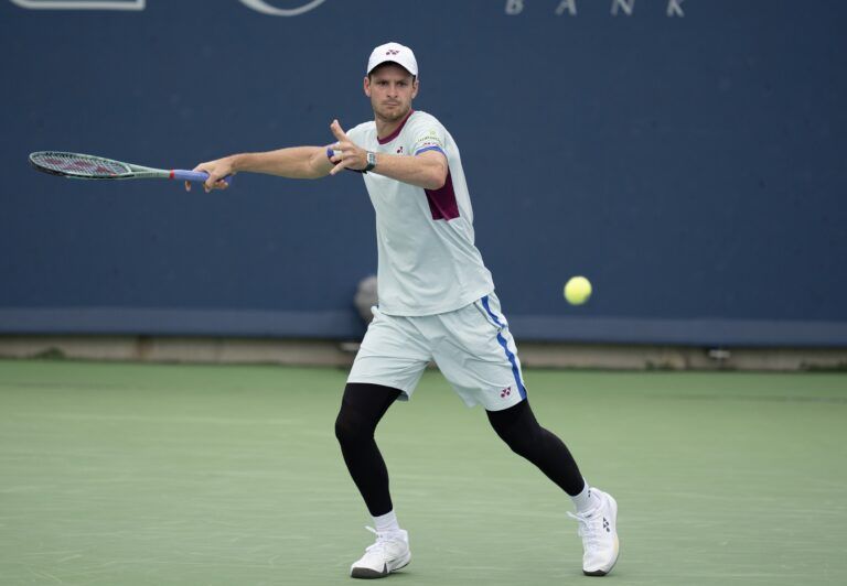 Hubert Hurkacz of Poland returns a shot during his match against Flavio Cobolli of Italy on day five of the Cincinnati Open.
