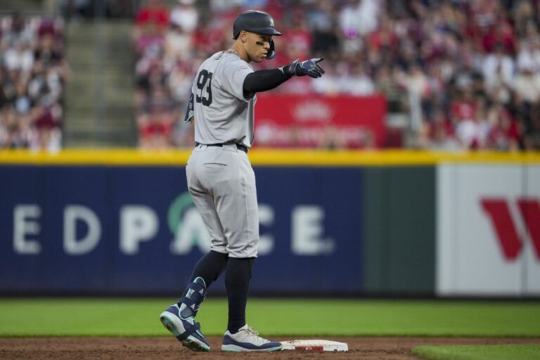 New York Yankees outfielder Aaron Judge gestures after hitting an RBI double against the Cincinnati Reds in the sixth inning at Great American Ball Park.