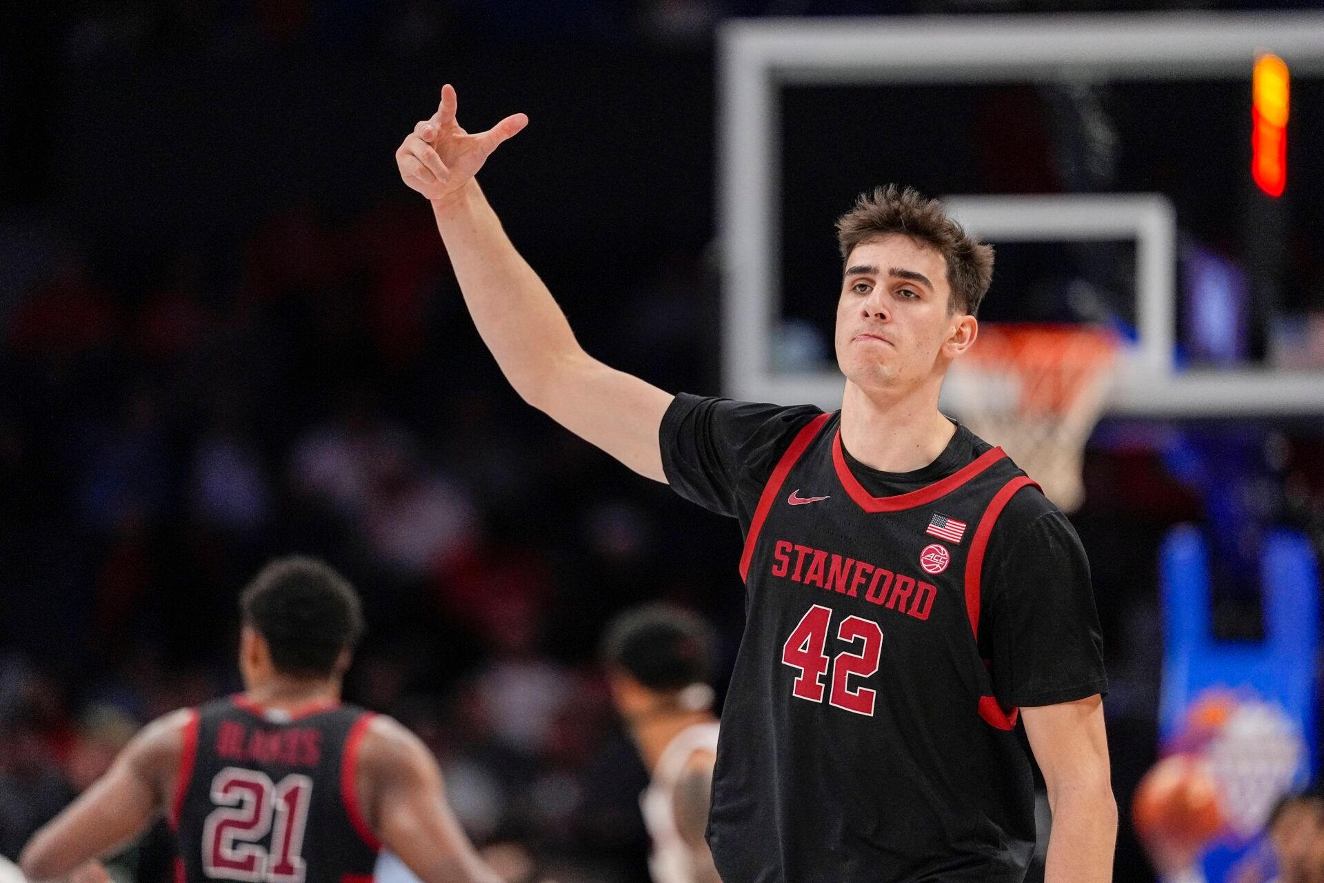 Stanford Cardinal forward Maxime Raynaud (42) after a dunk against the Louisville Cardinals during the second half at Spectrum Center.