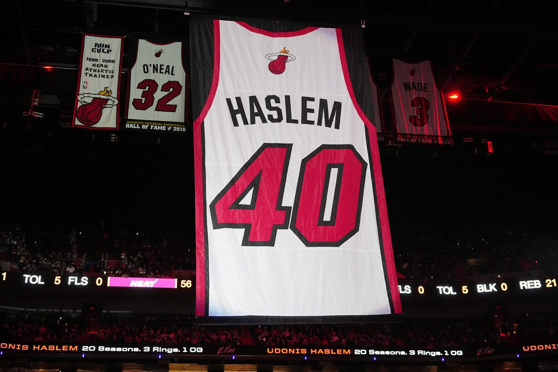 The jersey of Udonis Haslem is lifted to the rafters during the retirement ceremony during halftime of the game between the Miami Heat and the Atlanta Hawks Kaseya Center.