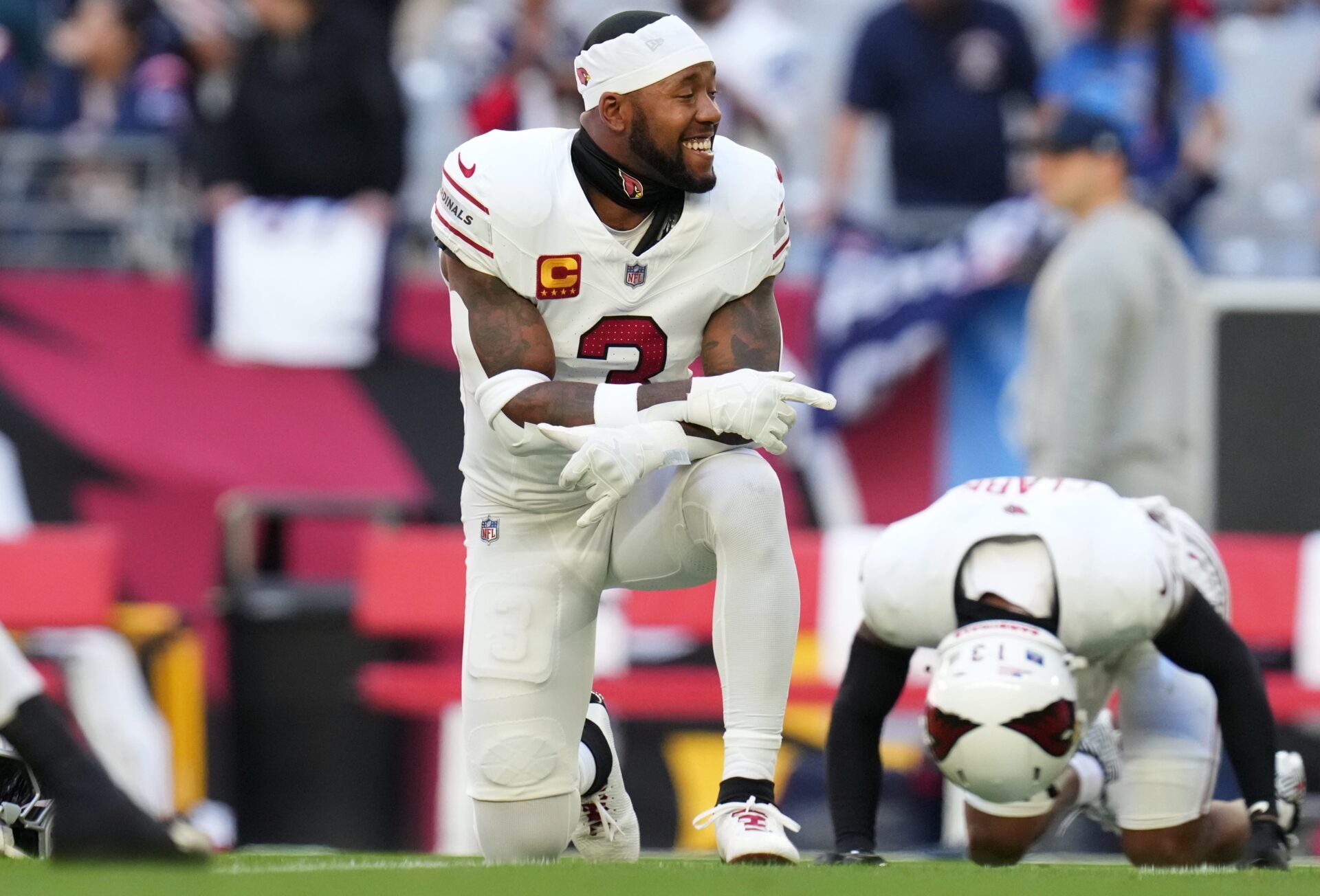 Arizona Cardinals safety Budda Baker (1) stretches before they play the New England Patriots at State Farm Stadium on Dec. 15, 2024.