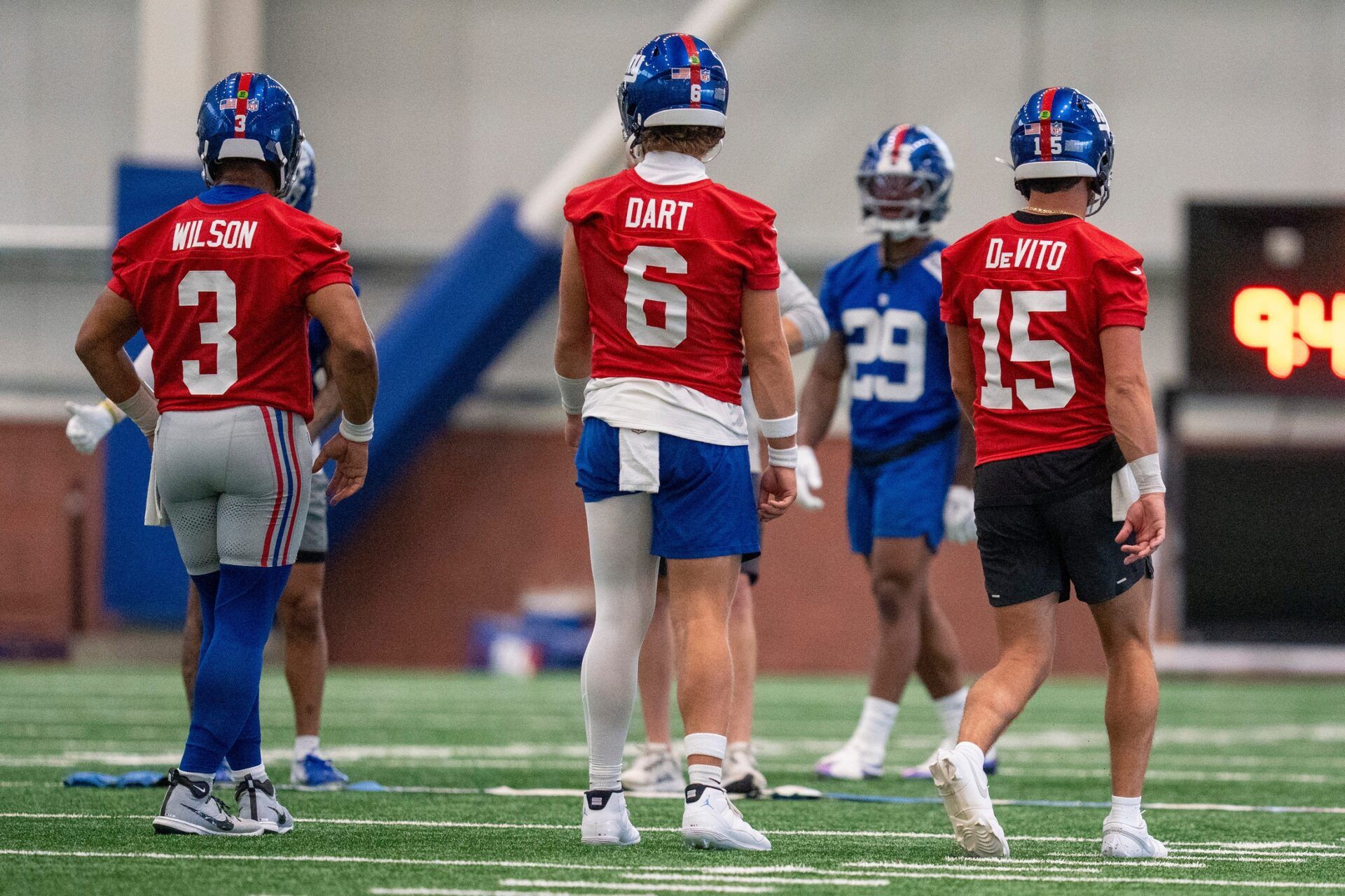 New York Giants quarterbacks Russell Wilson (3), Jaxson Dart (6) and Tommy DeVito (15) perform drills together during Mandatory Minicamp at Quest Diagnostics Giants Training Center in East Rutherford on Tuesday, June 17, 2025.