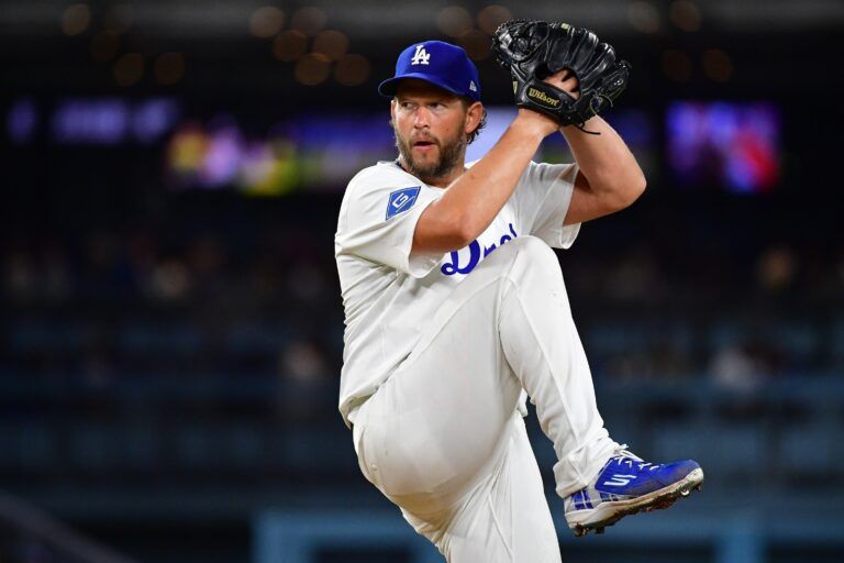 Los Angeles Dodgers pitcher Clayton Kershaw (22) throws against the New York Mets during the fifth inning at Dodger Stadium.