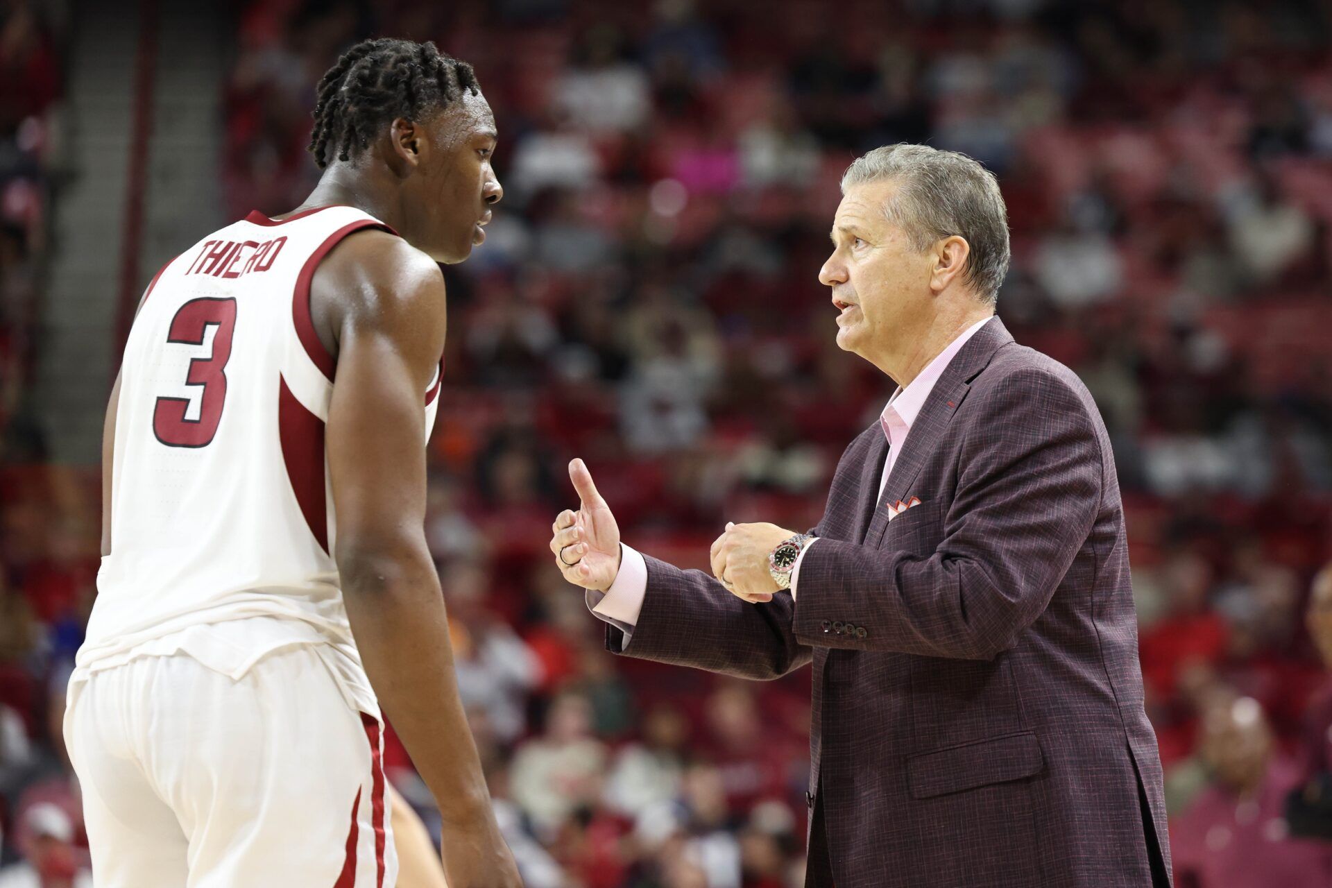 Arkansas Razorbacks head coach John Calipari talks to forward Adou Thiero (3) during the second half against the Little Rock Trojans at Bud Walton Arena. Arkansas won 79-67.