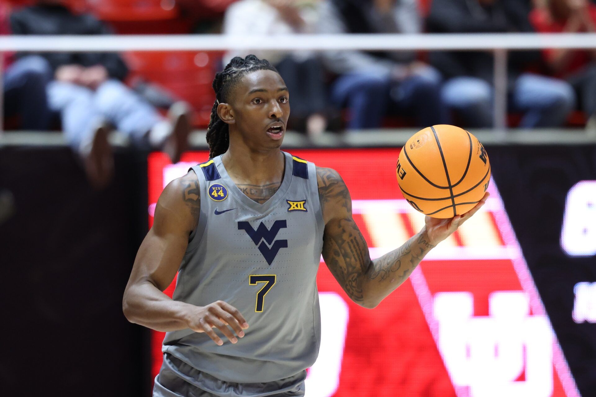 West Virginia Mountaineers guard Javon Small (7) brings the ball up the court against the Utah Utes during the first half at Jon M. Huntsman Center.