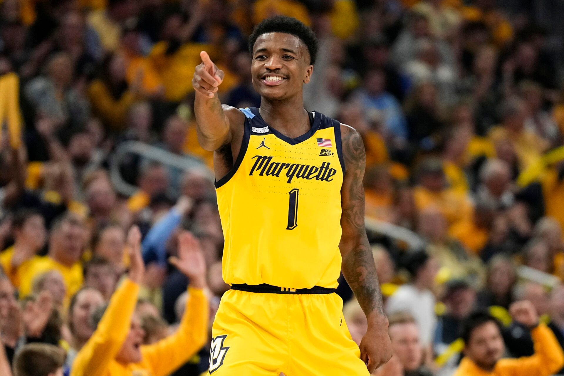 Marquette Golden Eagles guard Kam Jones (1) reacts after scoring a a basket during the second half against the Xavier Musketeers at Fiserv Forum.