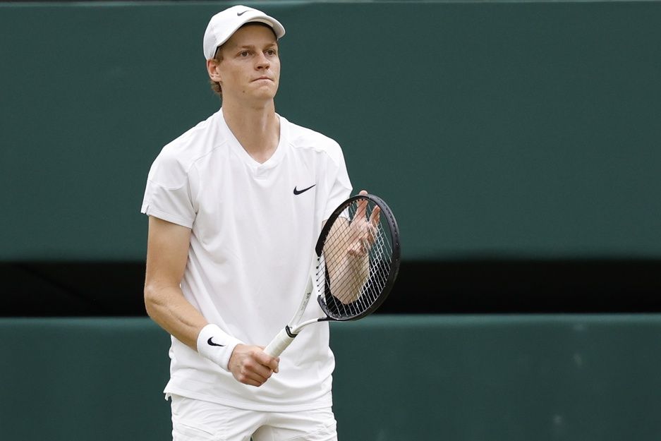 Jannik Sinner (ITA) reacts after missing a shot against Daniil Medvedev (not pictured) in a gentlemen's singles quarter-final match on day nine of The Championships Wimbledon 2024 at The All England Lawn Tennis Club.
