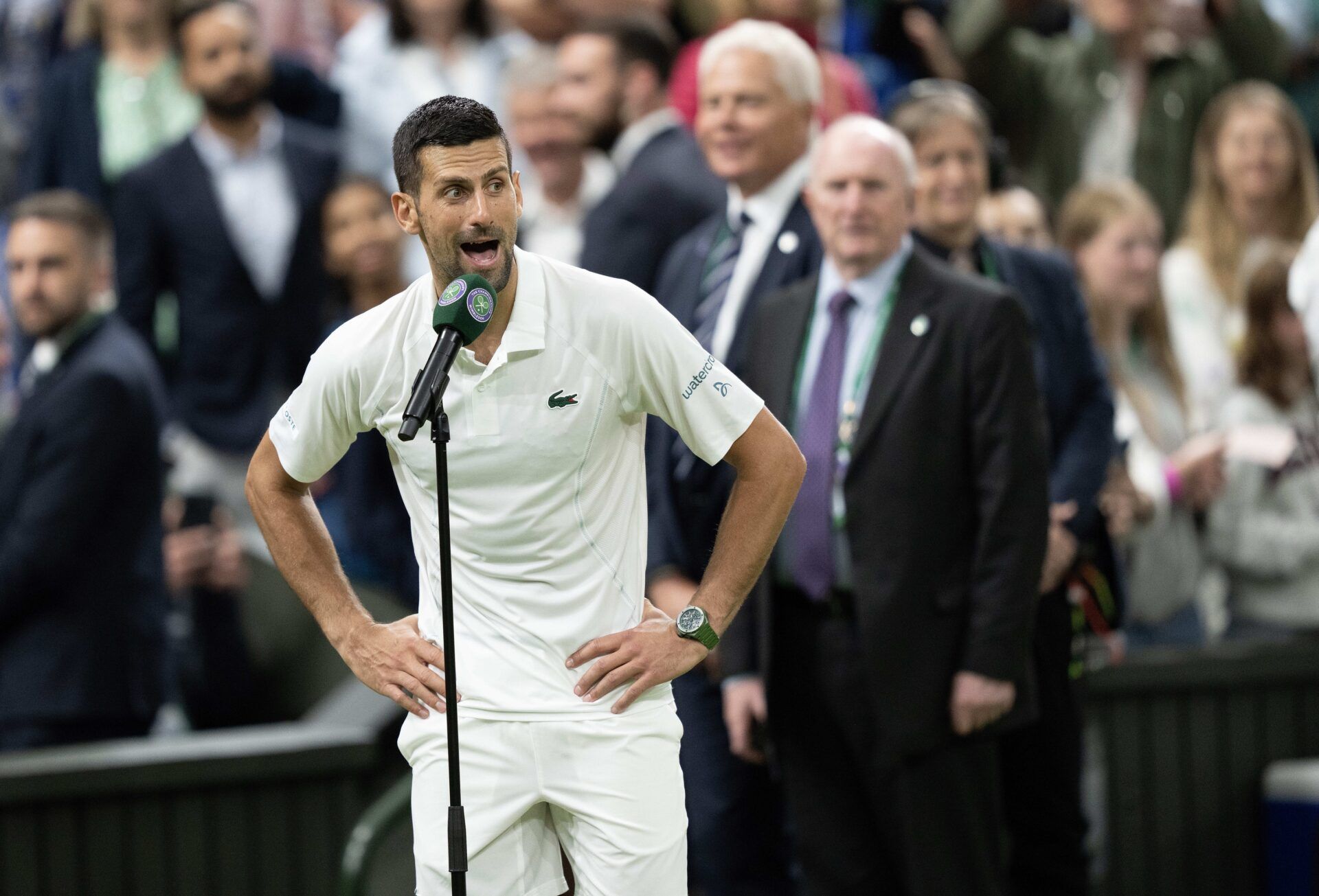 Novak Djokovic of Serbia at his on court interview after winning his match against Holger Rune of Denmark (not shown) on day eight of The Championships at All England Lawn Tennis and Croquet Club.