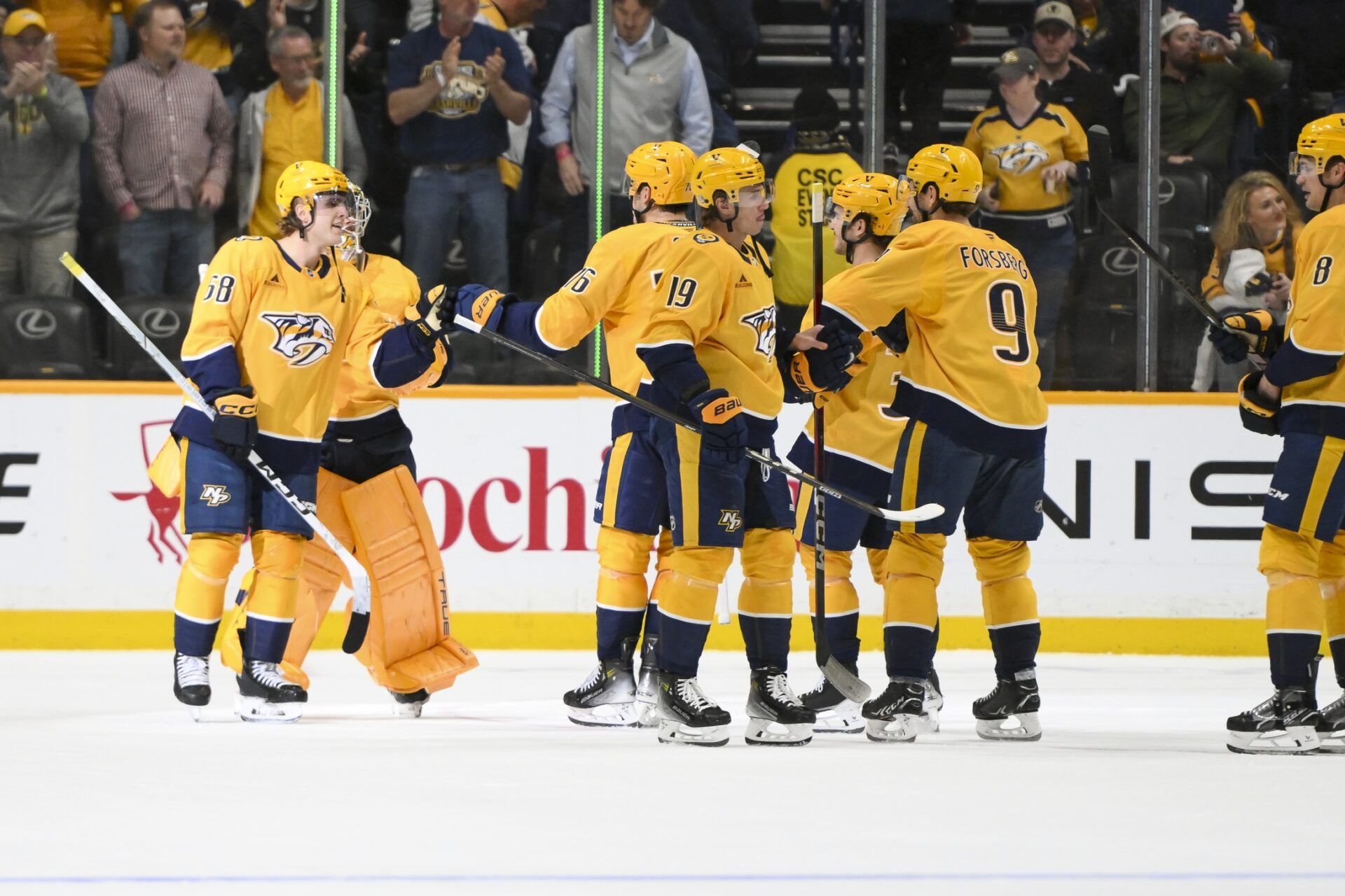 Nashville Predators celebrate the win against the Dallas Stars during the third period at Bridgestone Arena.
