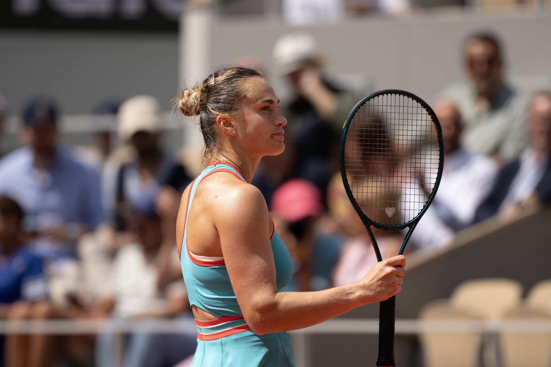 Aryna Sabalenka reacts to a point during her match against Qinwen Zheng  of China on day 10 at Roland Garros Stadium.