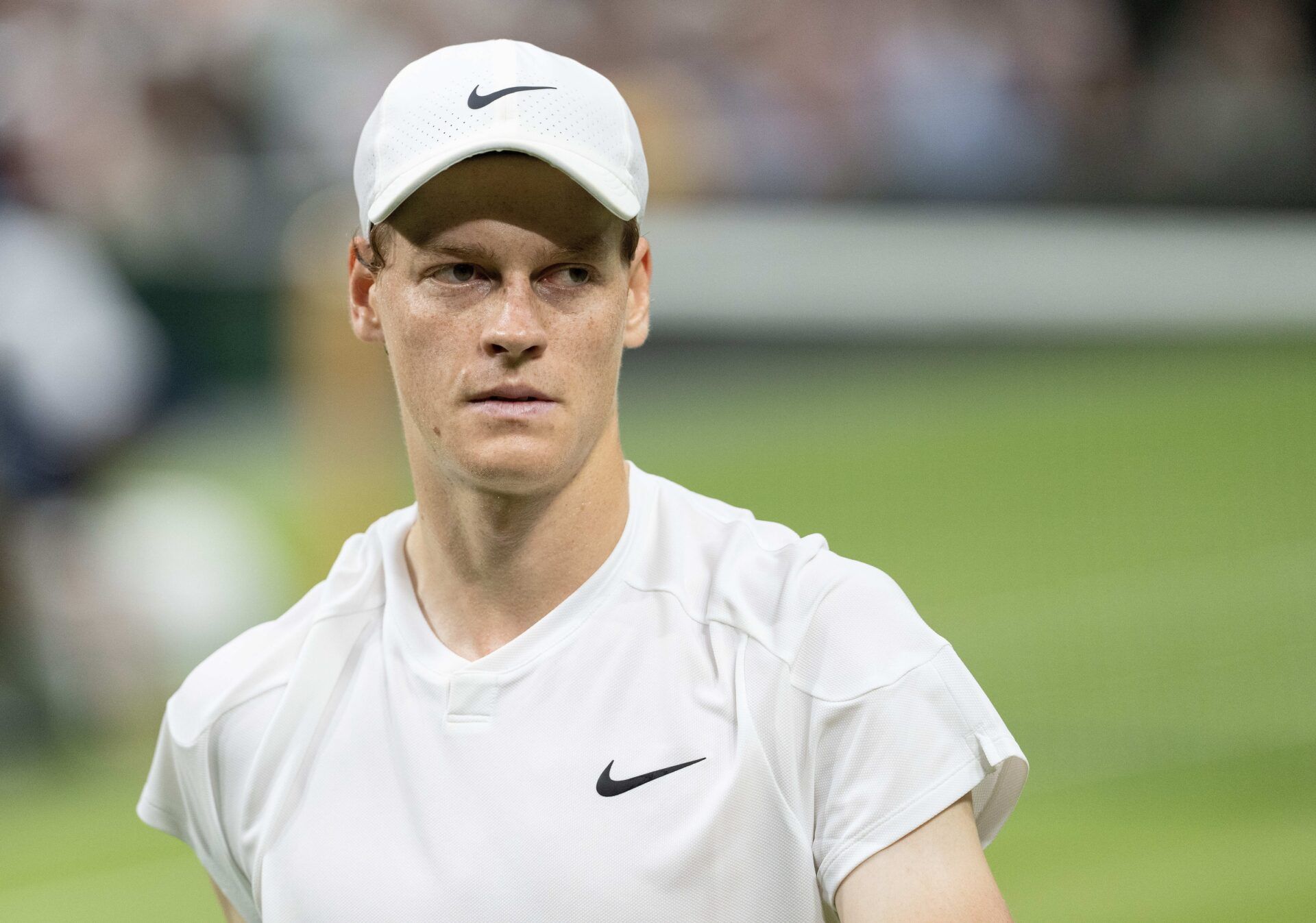 Jannik Sinner of Italy  during his match against Matteo Berrettini of Italy (not shown) on day three of The Championships at All England Lawn Tennis and Croquet Club.