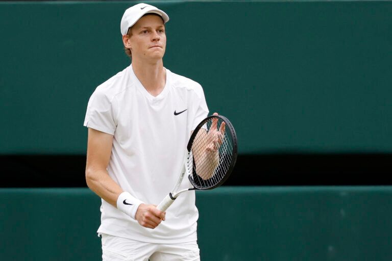 Jannik Sinner (ITA) reacts after missing a shot against Daniil Medvedev (not pictured) in a gentlemen's singles quarter-final match on day nine of The Championships Wimbledon 2024 at The All England Lawn Tennis Club.
