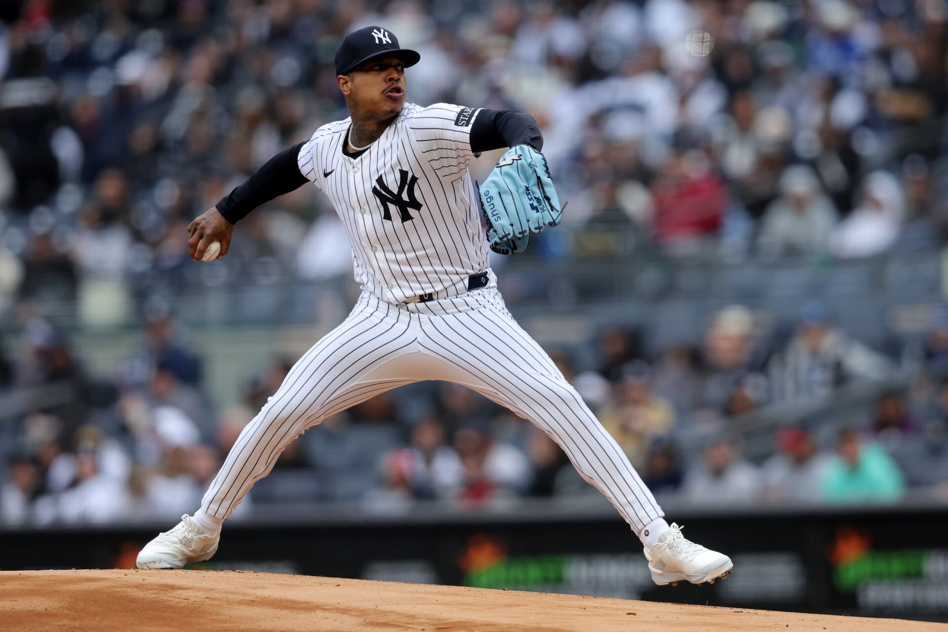 New York Yankees starting pitcher Marcus Stroman (0) pitches against the Milwaukee Brewers during the first inning at Yankee Stadium.