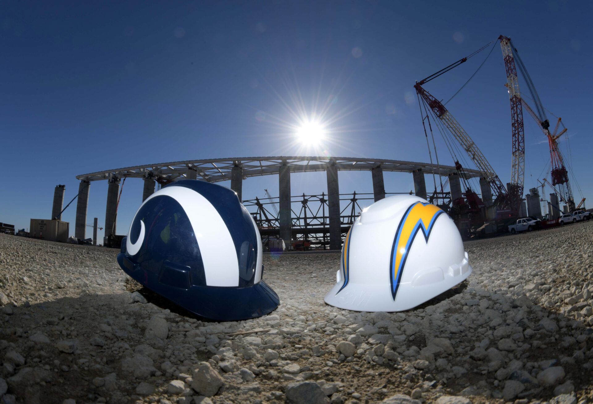 General overall view of hard hats with the logos of the Los Angeles Chargers (left) and Los Angeles Rams at the the construction site of LA Stadium & Entertainment District at Hollywood Park. The facility, scheduled to open in 2020, will be the home of the Chargers and the Rams. It will also play host to Super Bowl LVI in 2022, the College Football national championship in 2023 and the 2028 Olympic Games opening and closing ceremonies.
