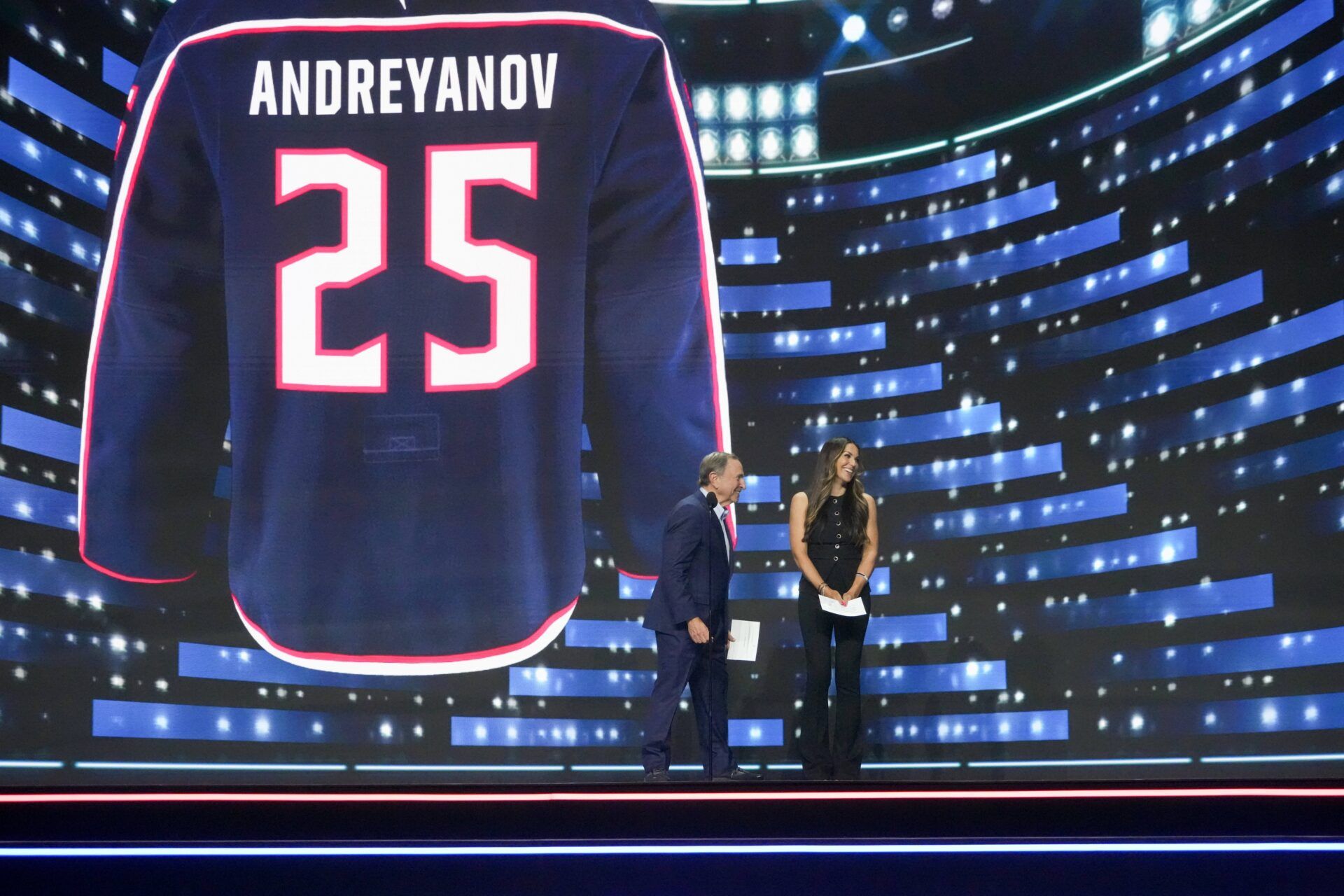 NHL Commissioner Gary Bettman and Meredith Gaudreau announce Pyotr Andreyanov as the 20th overall pick by the Columbus Blue Jackets in the first round of the 2025 NHL Draft at Peacock Theater.