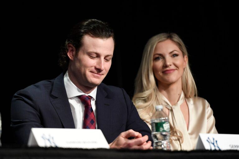 New New York Yankees pitcher Gerrit Cole and wife Amy Crawford smile as manager Aaron Boone (not pictured) speaks about signing Cole during a press conference at Legends Club at Yankee Stadium.

Yanks Cole Presser