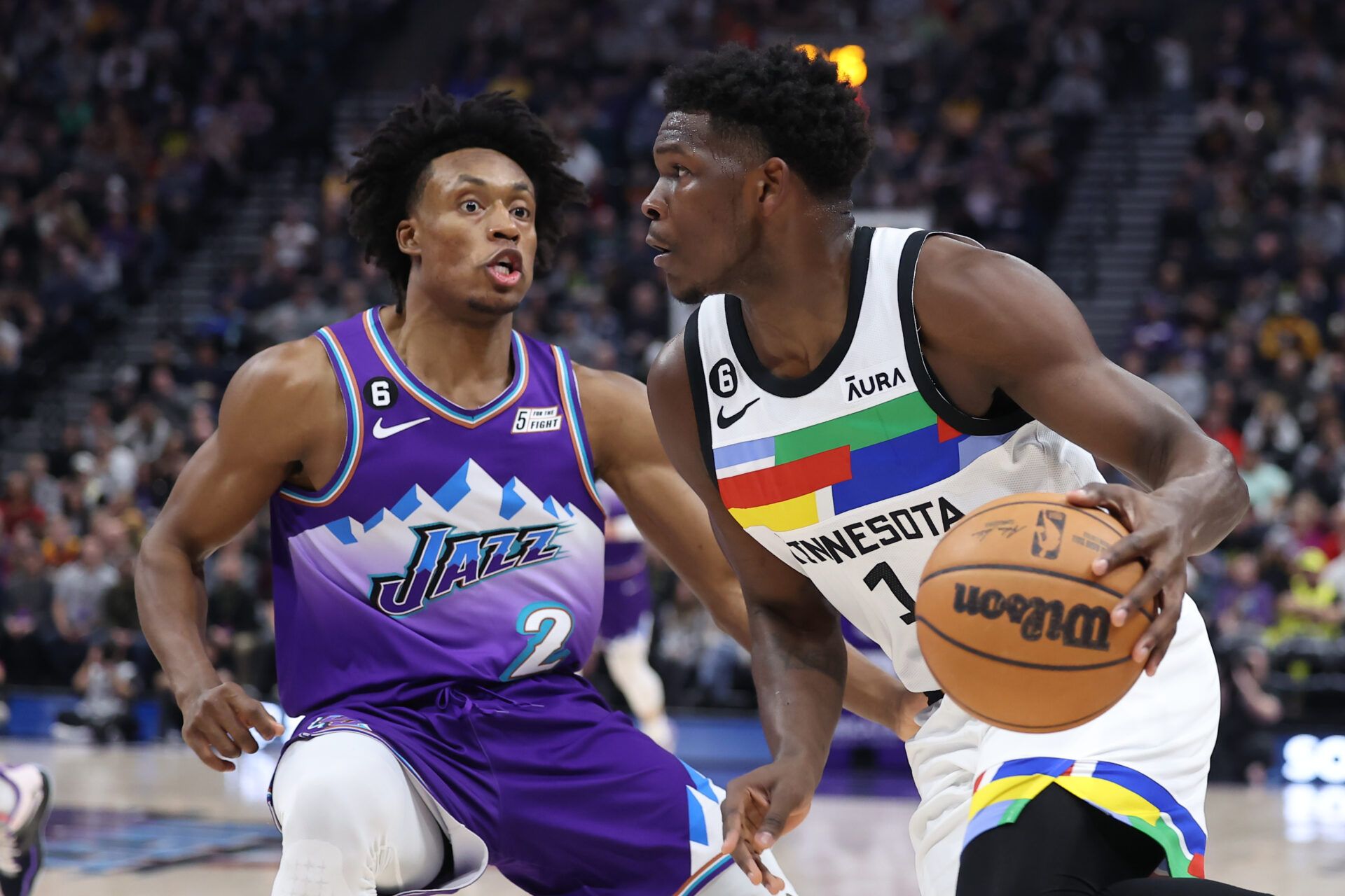 Minnesota Timberwolves guard Anthony Edwards (1) drives against Utah Jazz guard Collin Sexton (2) in the first quarter at Vivint Arena.