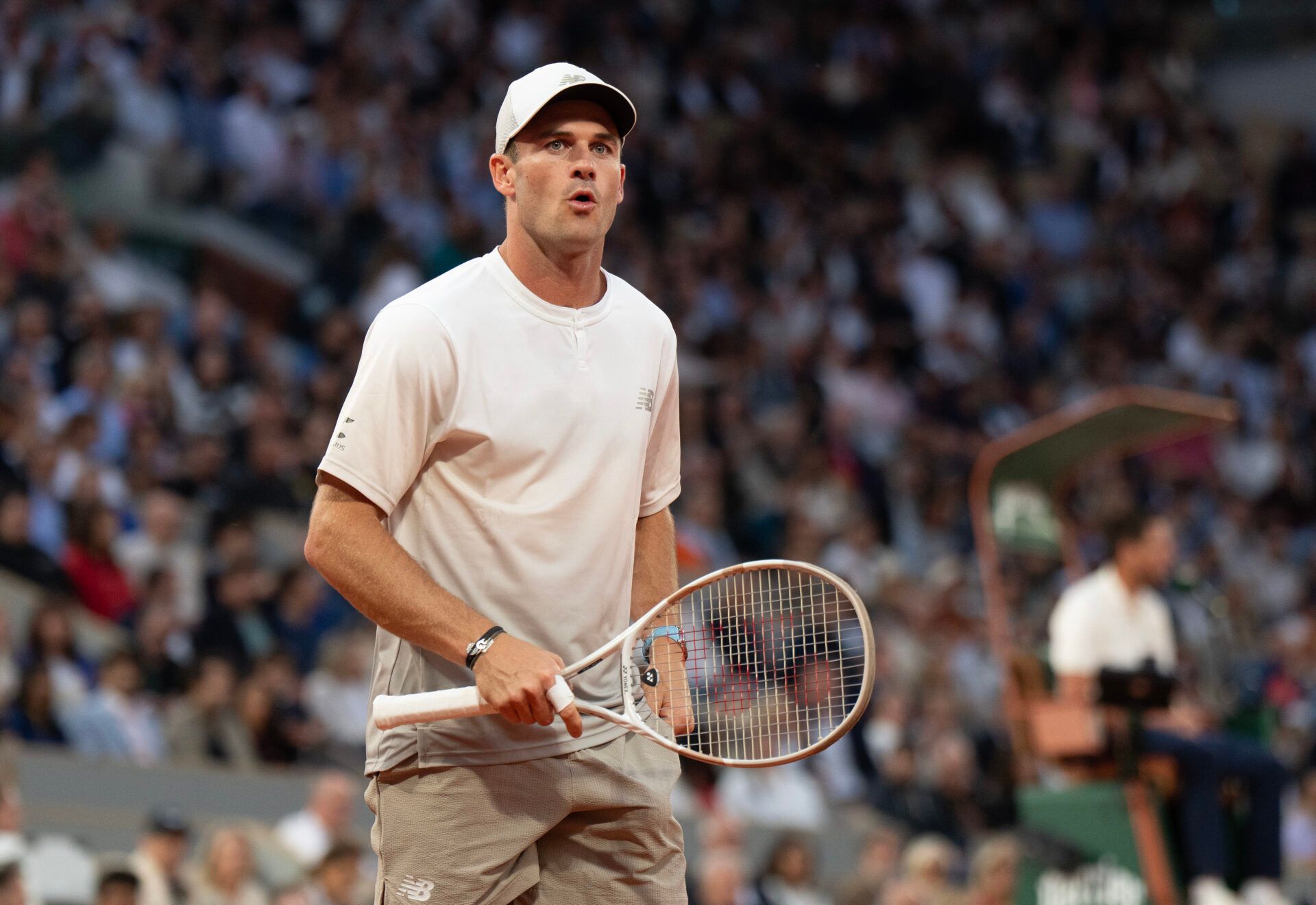 Tommy Paul of the United States reacts to a point during his match  against Carlos Alcaraz of Spain on day 10 at Roland Garros Stadium.