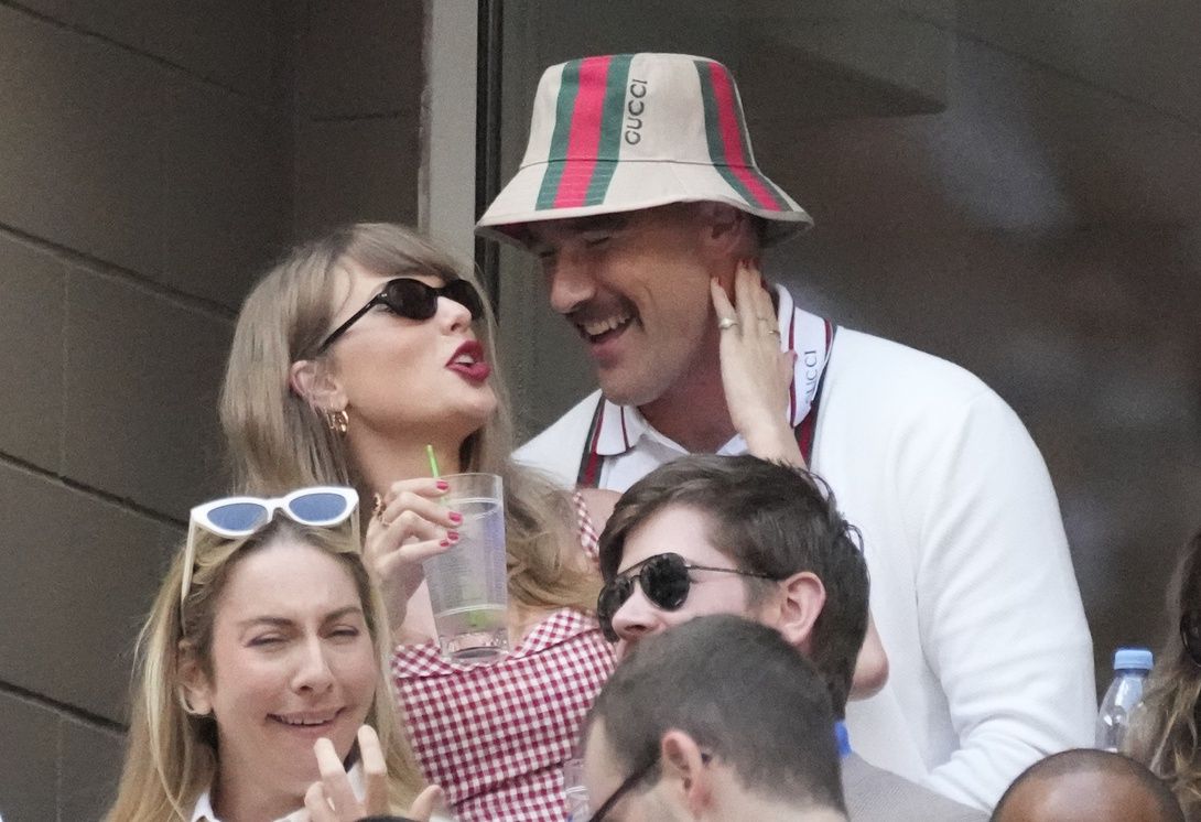 Recording artist Taylor Swift and Kansas City Chiefs tight end Travis Kelce talk during the men’s singles final of the 2024 U.S. Open tennis tournament at USTA Billie Jean King National Tennis Center.