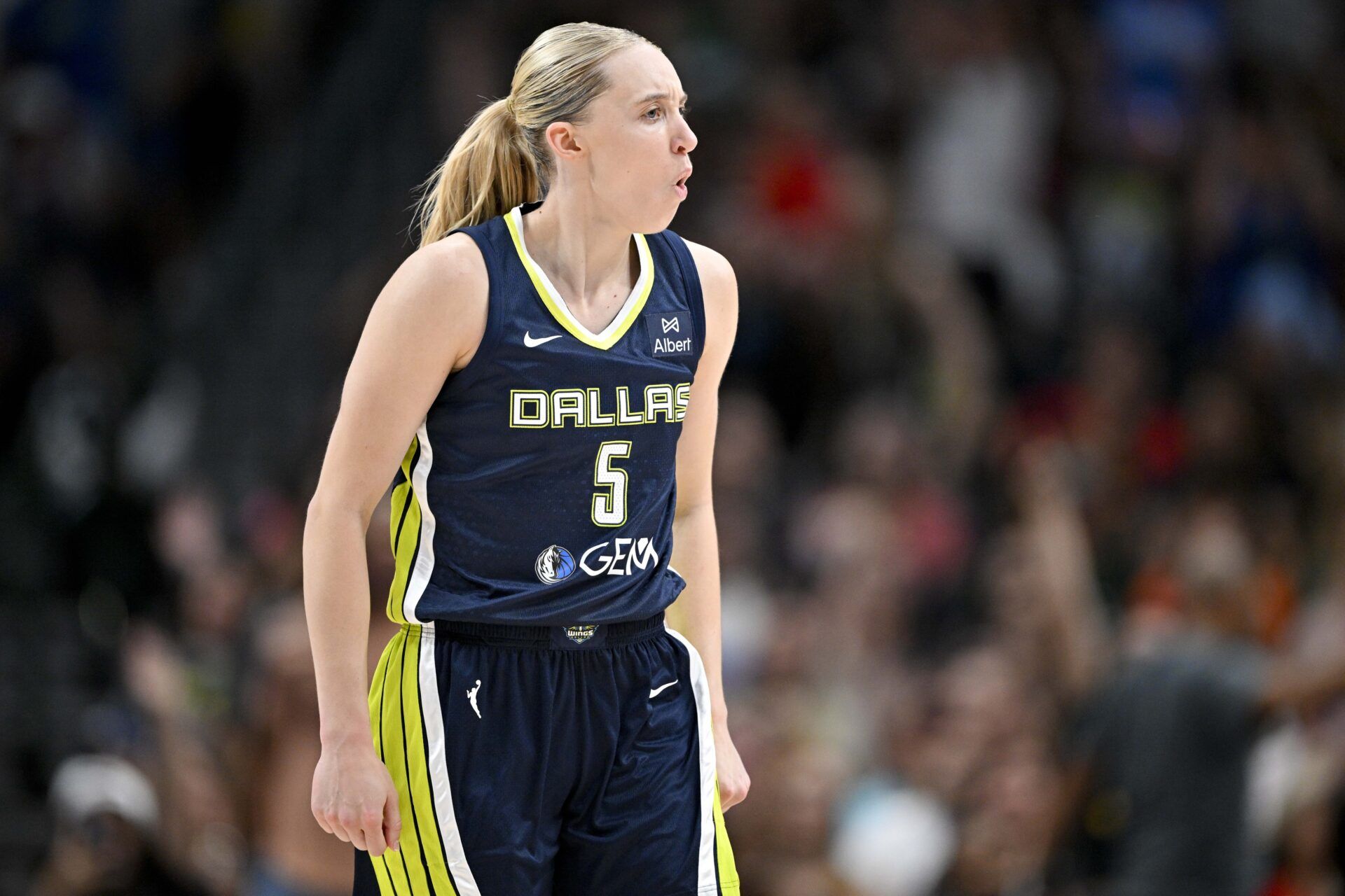 Dallas Wings guard Paige Bueckers (5) celebrates during the second half against the Indiana Fever at the American Airlines Center.