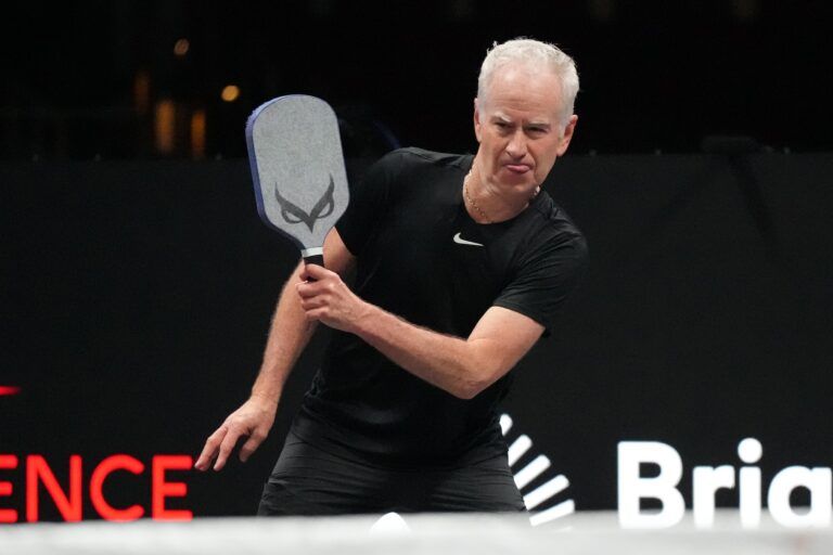 John McEnroe returns a volley during Pickleball Slam 2 at Hard Rock Live at Seminole Hard Rock Hotel & Casino.