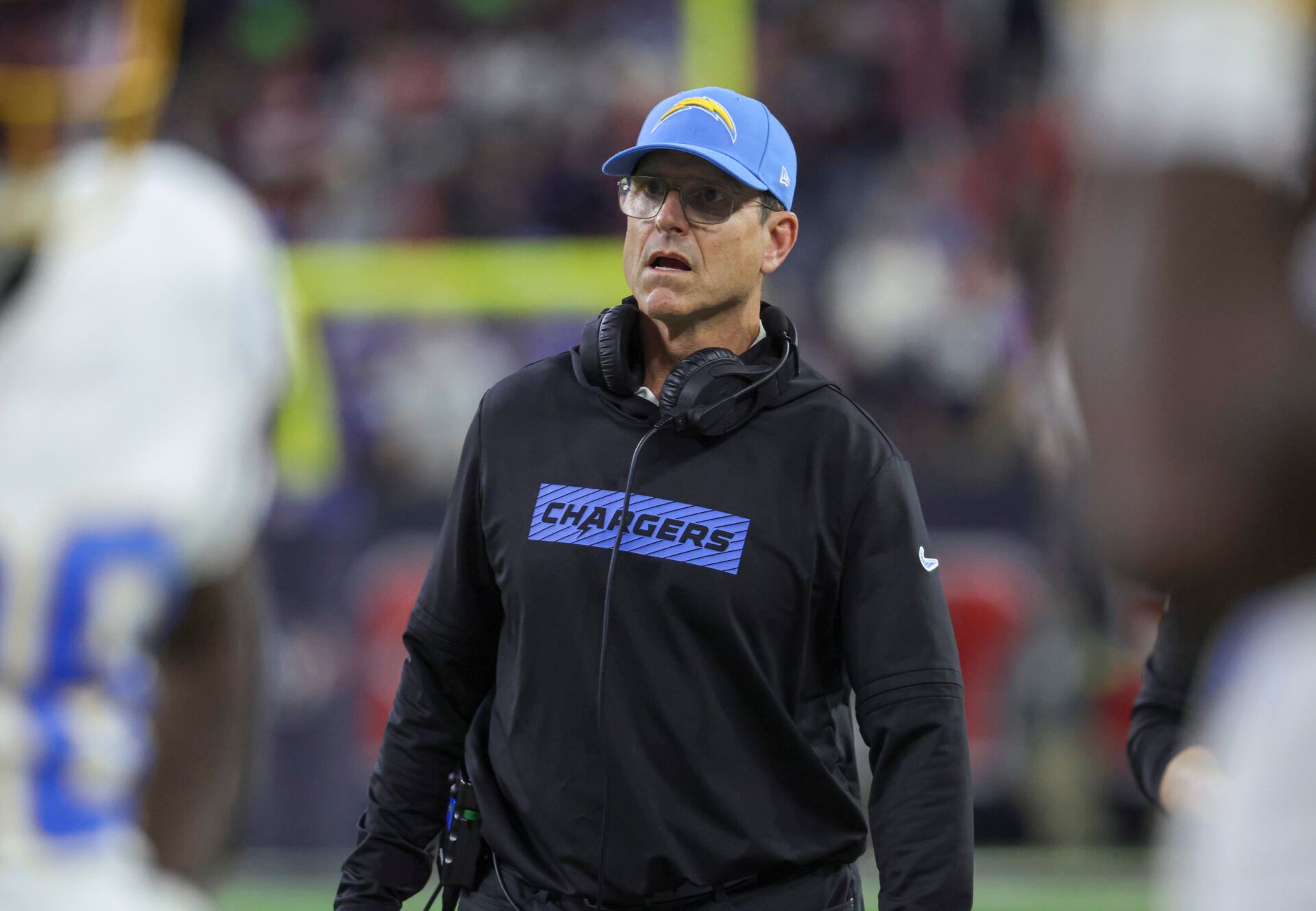 Los Angeles Chargers head coach Jim Harbaugh reacts during the game against the Houston Texans in an AFC wild card game at NRG Stadium.