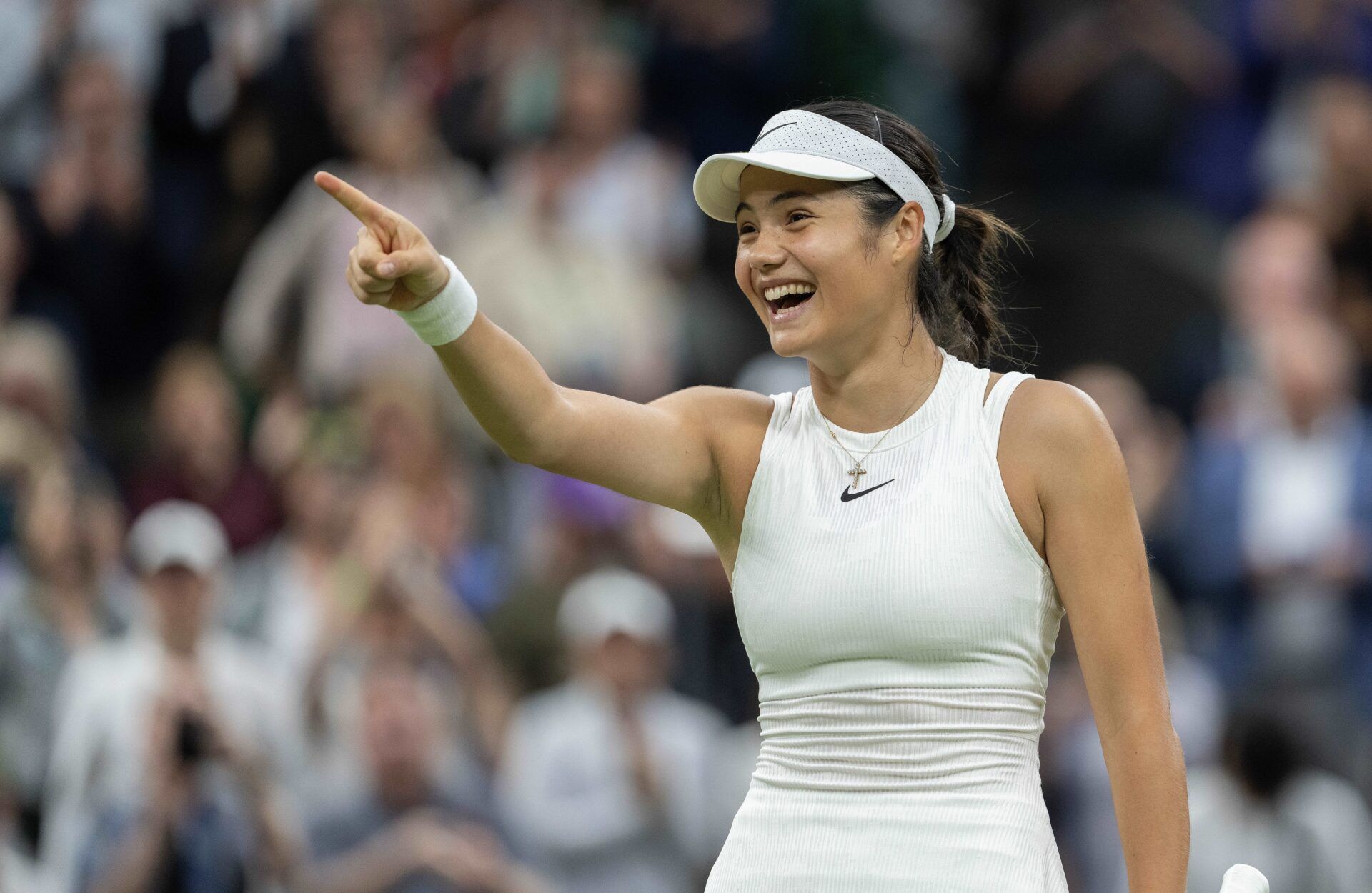 Emma Raducanu of Great Britain celebrates winning her match against Maria Sakkara of Greece (not shown) on day five of The Championships at All England Lawn Tennis and Croquet Club.
