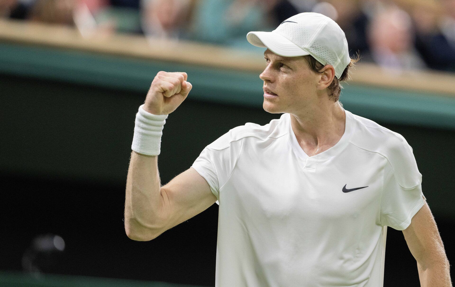 Jannik Sinner of Italy celebrates winning his match against Miomir Kecmanovic of Serbia (not shown) on day five of The Championships at All England Lawn Tennis and Croquet Club.
