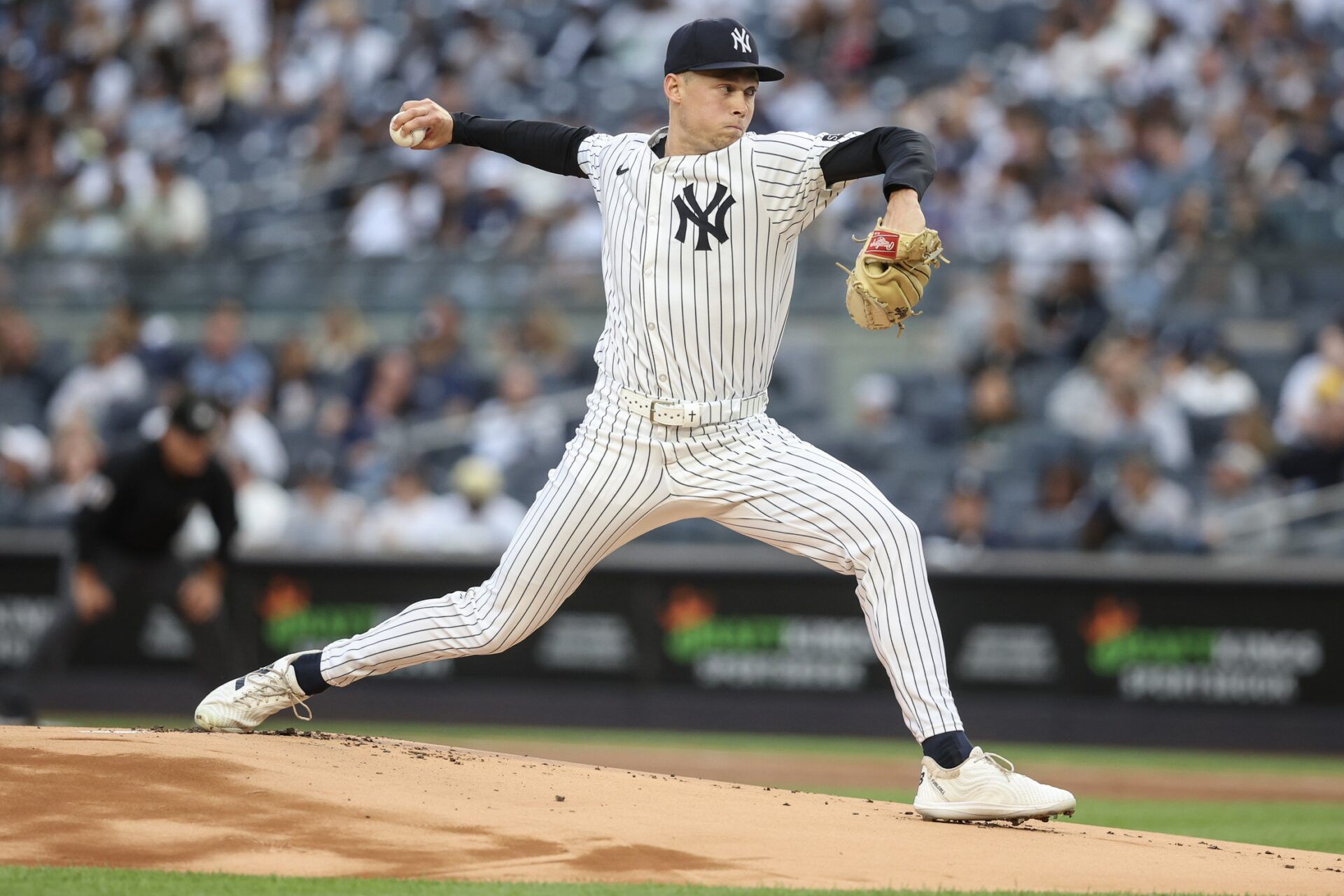 New York Yankees starting pitcher Will Warren (98) pitches in the first inning against the Athletics at Yankee Stadium.