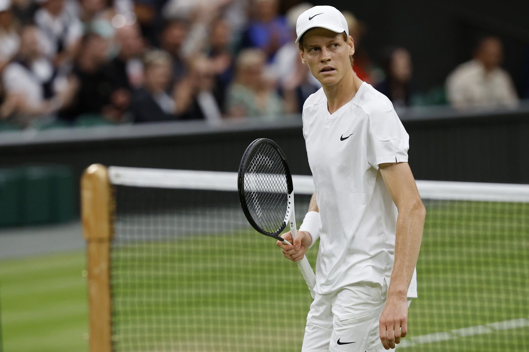 Jannik Sinner (ITA) reacts after winning a point against Daniil Medvedev (not pictured) in a gentlemen's singles quarter-final match on day nine of The Championships Wimbledon 2024 at The All England Lawn Tennis Club.