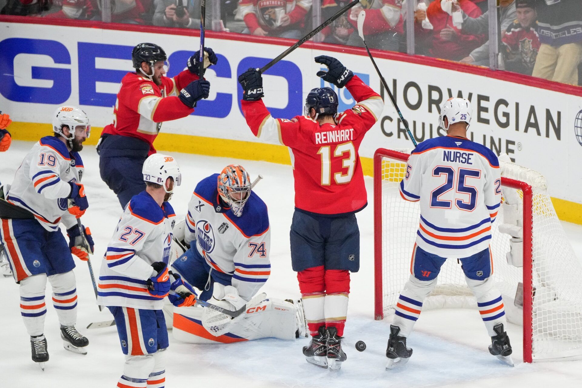 Florida Panthers center Sam Reinhart (13) celebrates after his goal as Edmonton Oilers goaltender Stuart Skinner (74) watches during the second period in game six of the 2025 Stanley Cup Final at Amerant Bank Arena.
