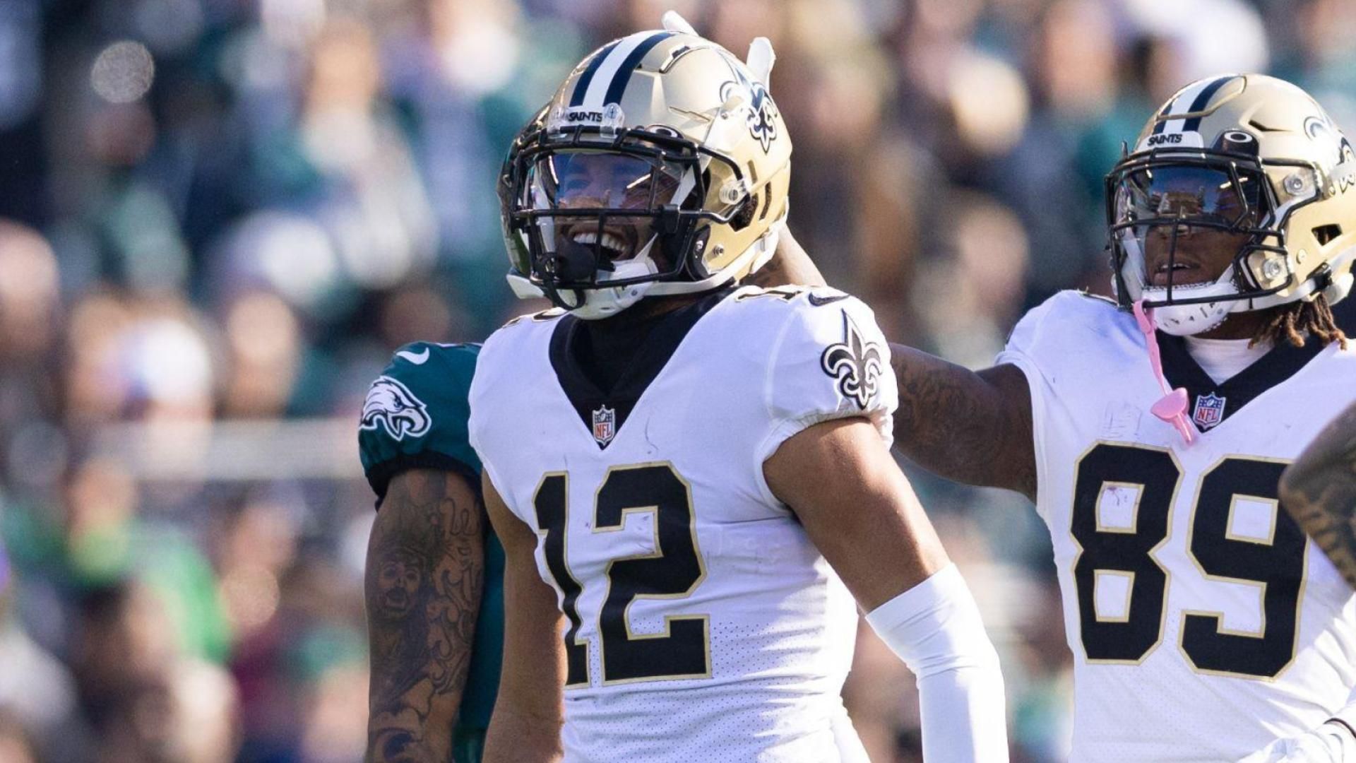 New Orleans Saints wide receiver Chris Olave (12) reacts to his first down catch against the Philadelphia Eagles during the first quarter at Lincoln Financial Field.
