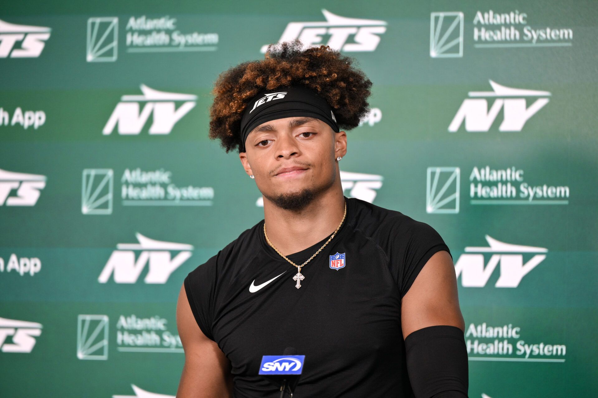 New York Jets quarterback Justin Fields (7) speaks at a press conference during minicamp at Atlantic Health Jets Training Center.