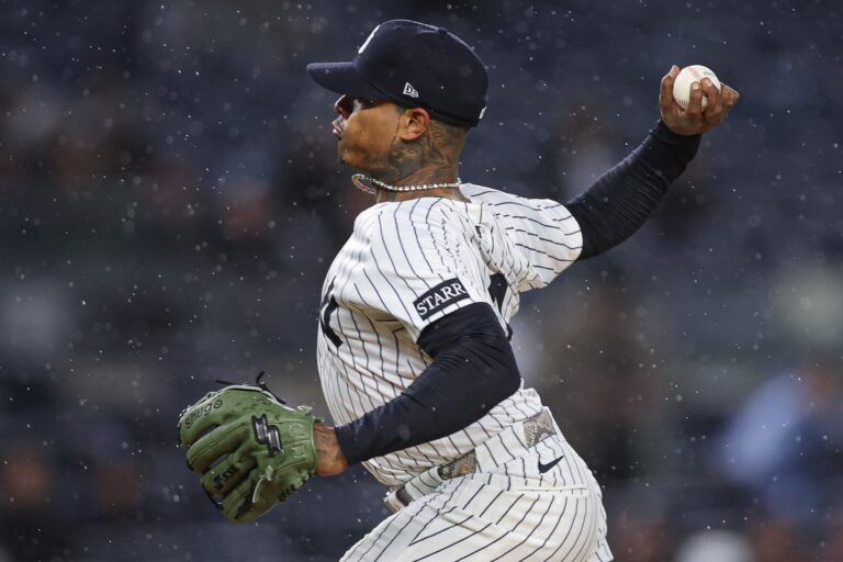 New York Yankees starting pitcher Marcus Stroman (0) delivers a pitch during the first inning against the San Francisco Giants at Yankee Stadium.