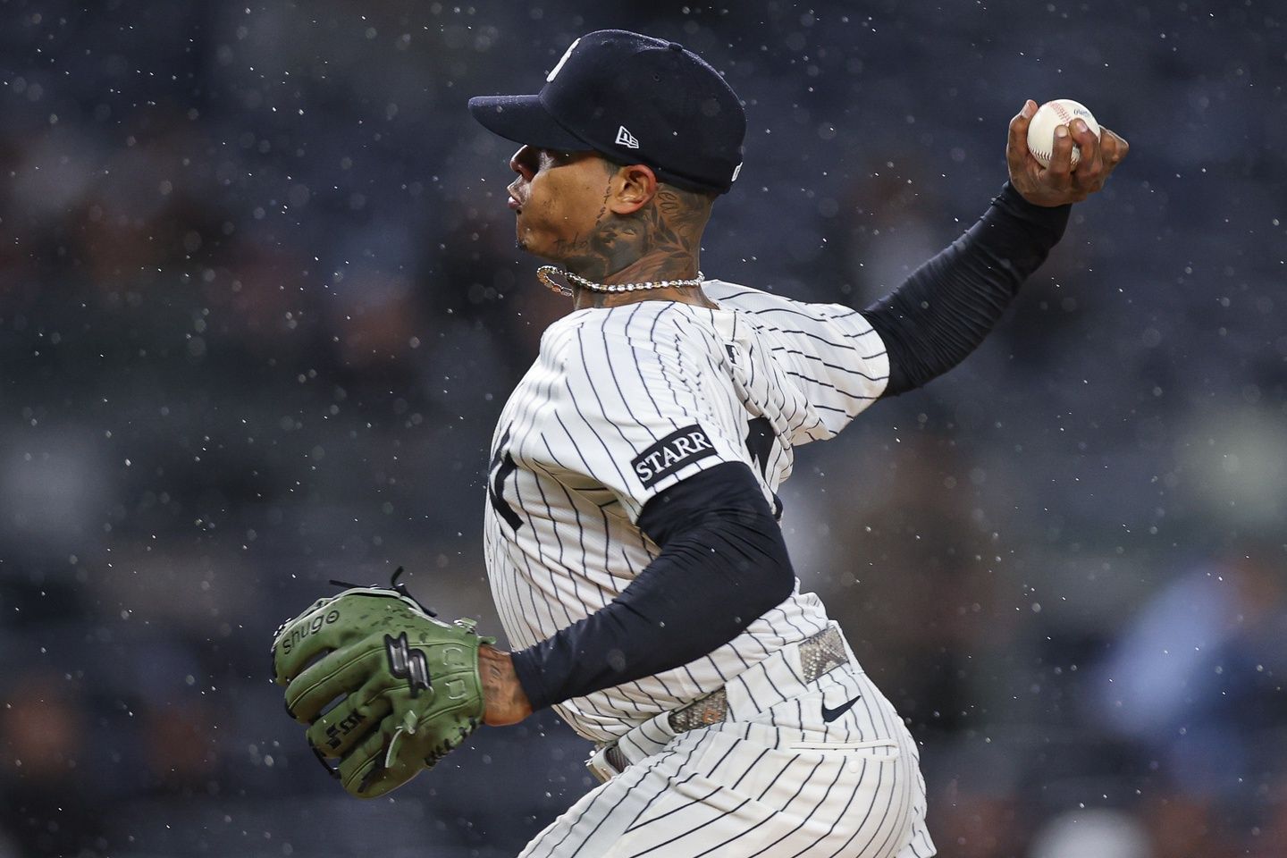 New York Yankees starting pitcher Marcus Stroman (0) delivers a pitch during the first inning against the San Francisco Giants at Yankee Stadium.