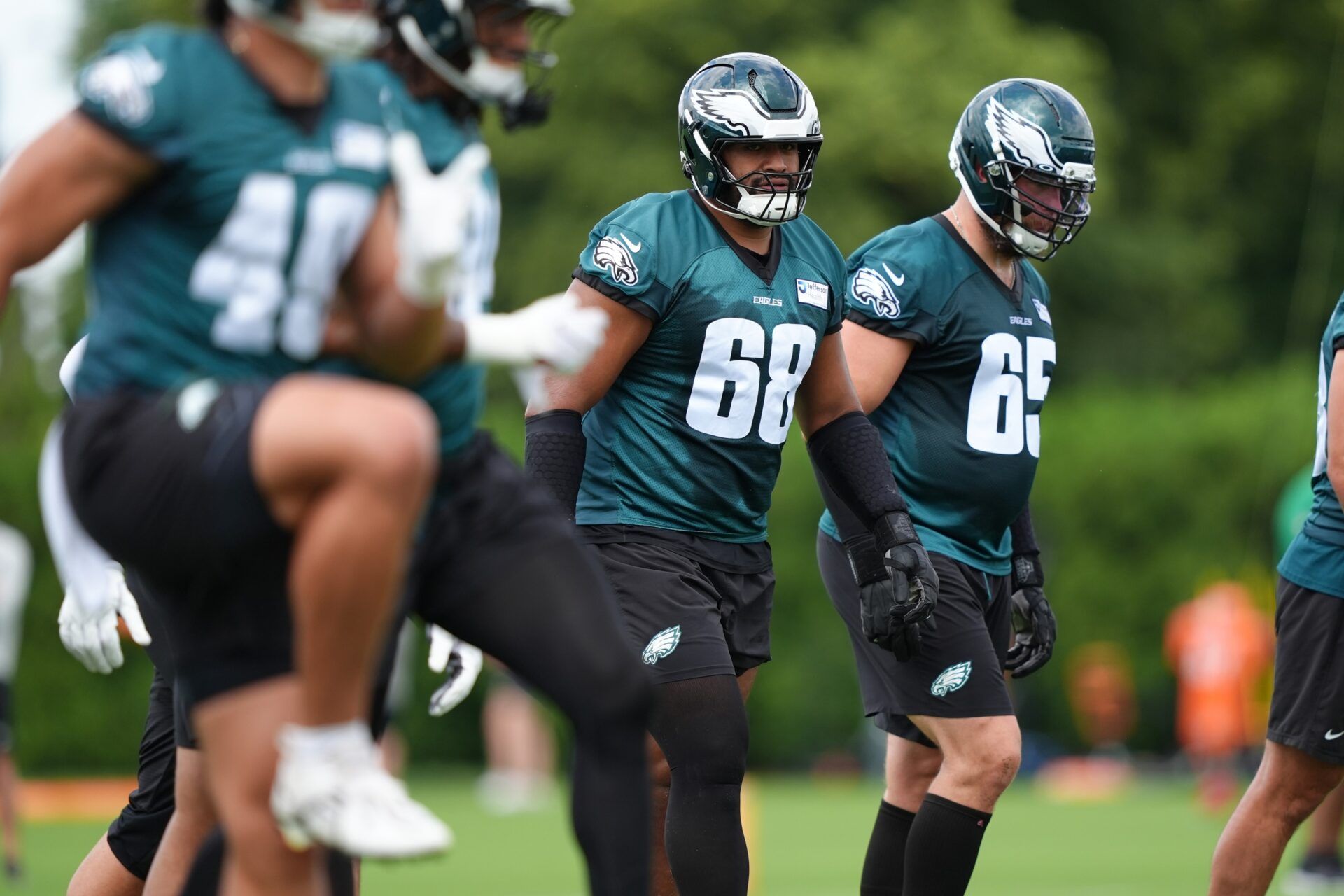 Philadelphia Eagles offensive lineman Jordan Mailata (68) warms up before a practice drill at NovaCare Complex.