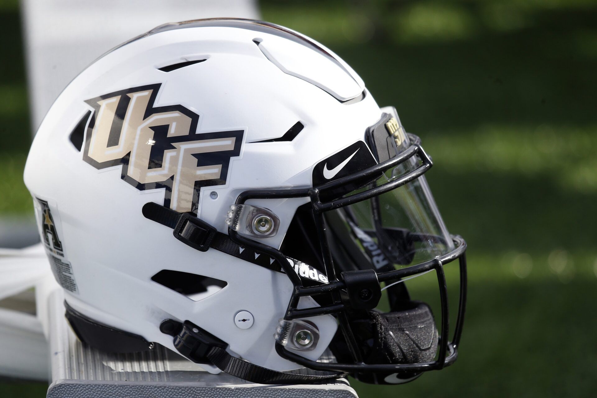 UCF Knights helmet on the sideline against the Memphis Tigers at Liberty Bowl Memorial Stadium.