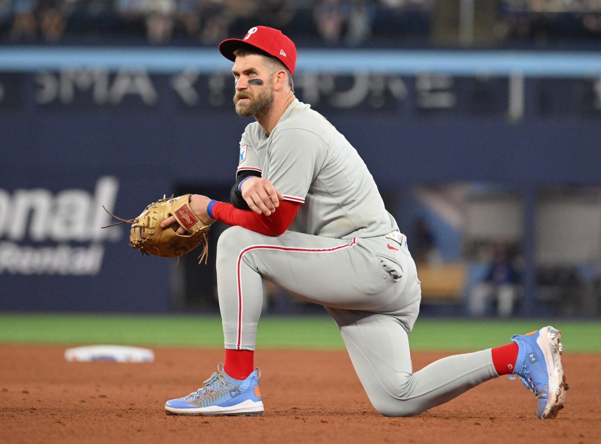 Philadelphia Phillies first baseman Bryce Harper (3) looks on during an injury delay in the ninth inning against the Toronto Blue Jays at Rogers Centre.