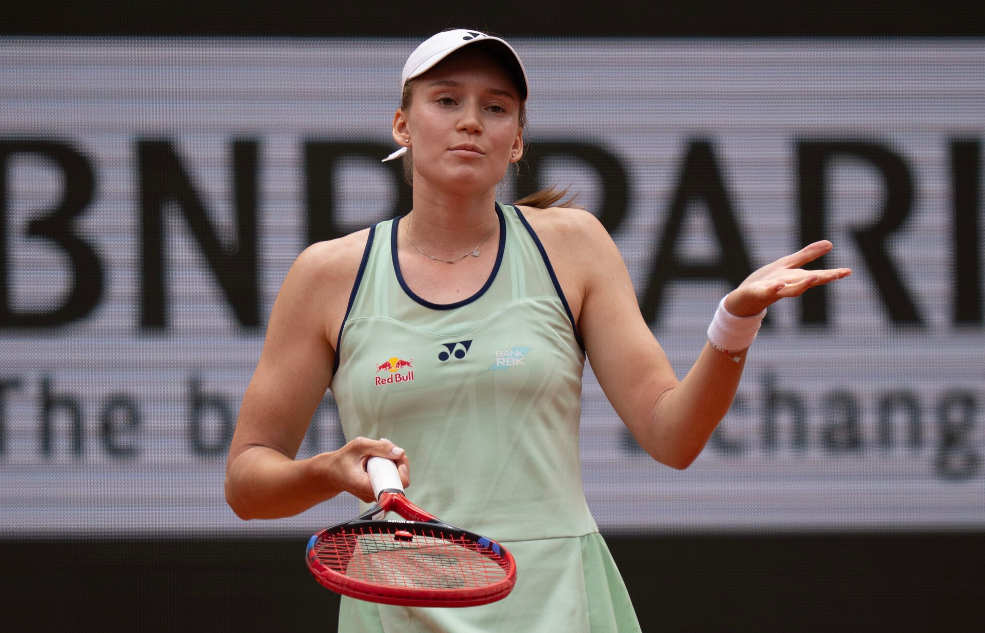 Elena Rybakina of Kazakhstan reacts to a point during her match against Iga Swiatek of Poland on day eight at Roland Garros Stadium.