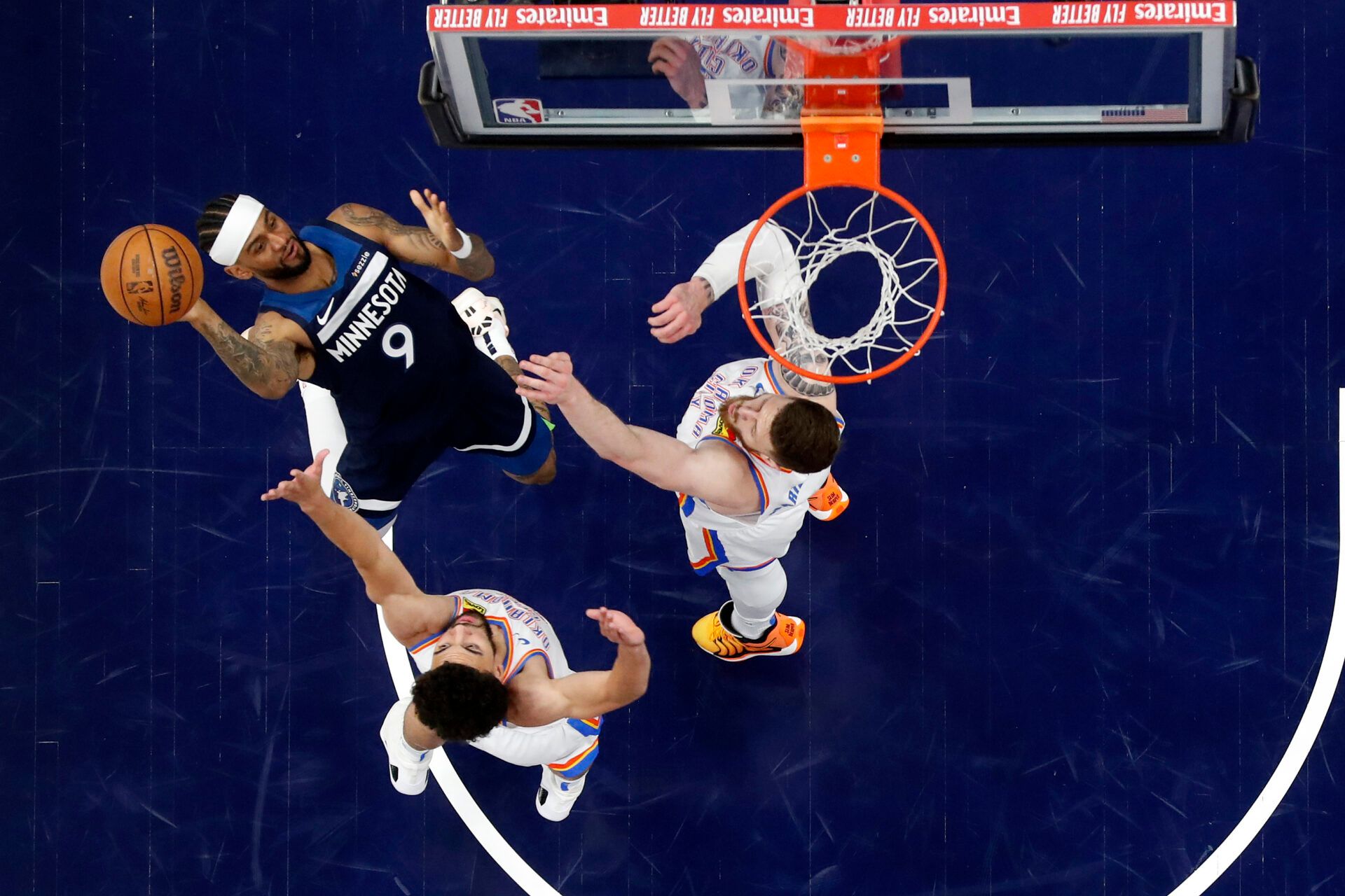Minnesota Timberwolves guard Nickeil Alexander-Walker (9) shoots the ball against the Oklahoma City Thunder during the second half in game three of the western conference finals for the 2025 NBA Playoffs at Target Center.
