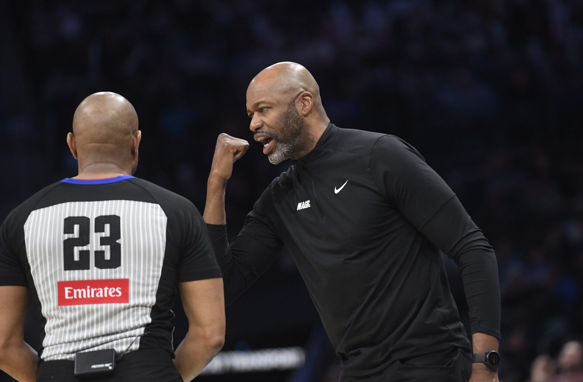 Orlando Magic head coach Jamahl Mosley has an exchange with official Tre Maddox (23) during the second half against the Charlotte Hornets at the Spectrum Center.
