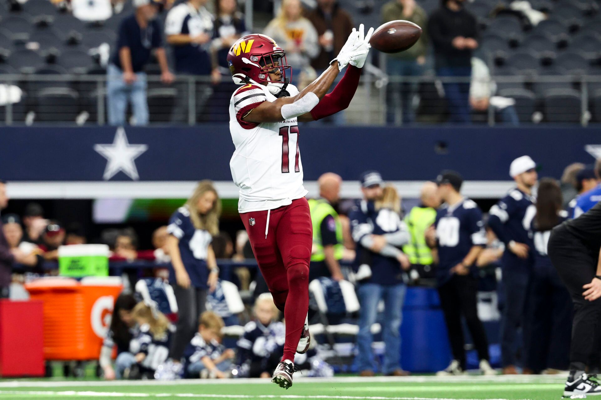 Washington Commanders wide receiver Terry McLaurin (17) warms up before the game against the Dallas Cowboys at AT&T Stadium.