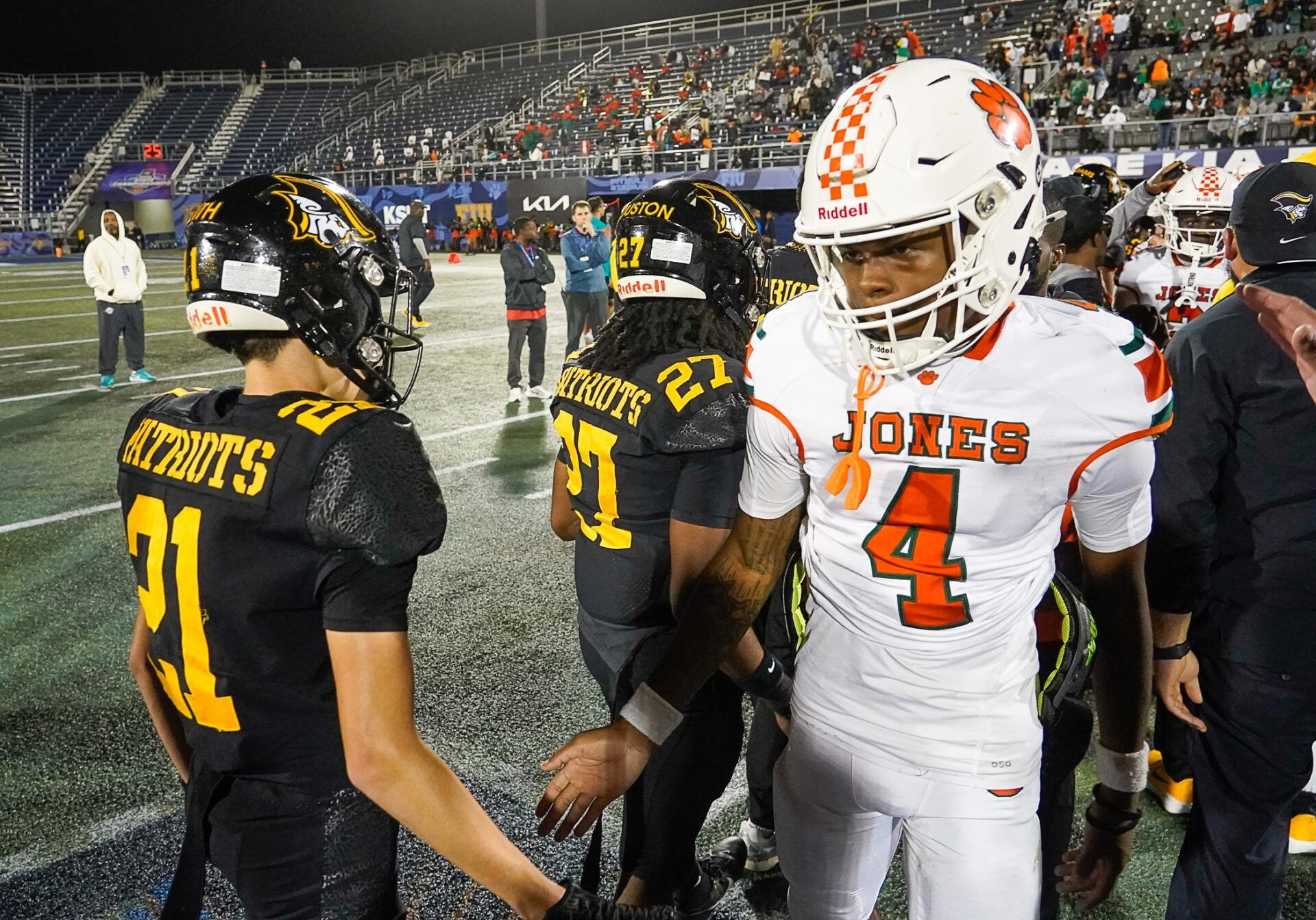 Jones Tigers quarterback (4) Dereon Coleman congratulates American Heritage Patriots players after the FHSAA Class 4A Football Championship on Friday, December 13, 2024 in Miami, Florida. Jeff Romance/Special to the USA Today Florida Network