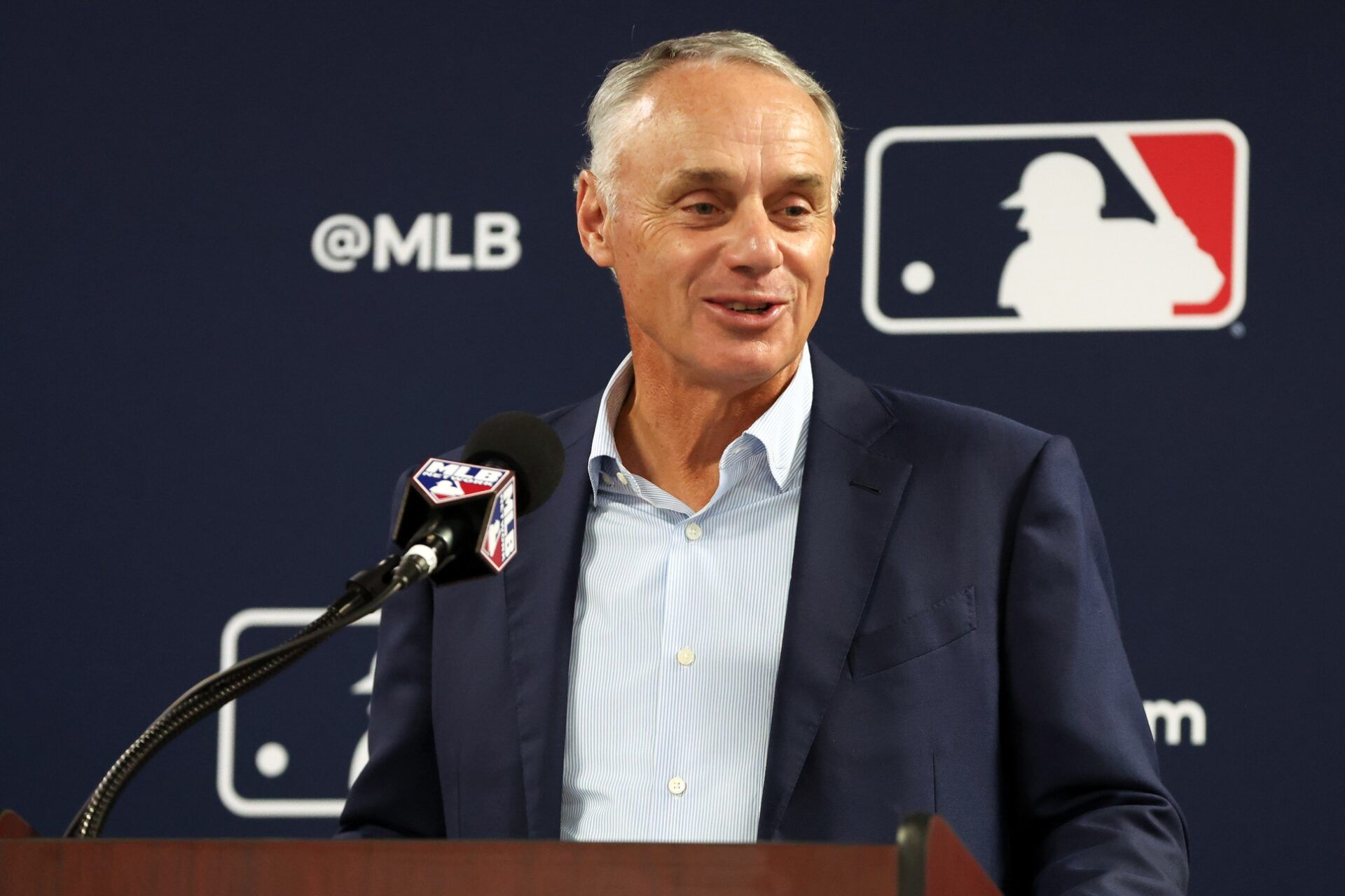 MLB commissioner Rob Manfred talks with media at George M. Steinbrenner Field.
