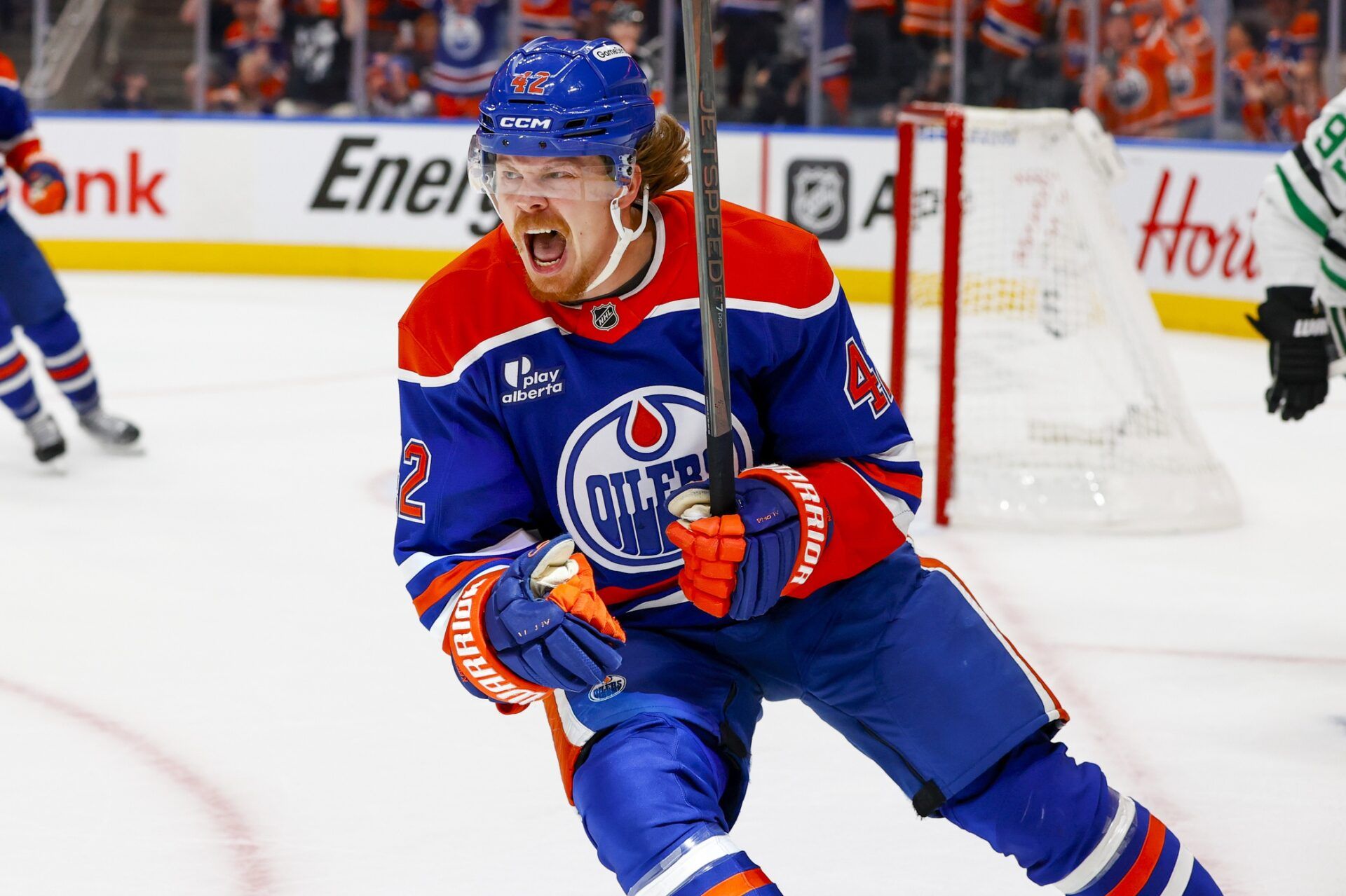 Edmonton Oilers right wing Kasperi Kapanen (42) celebrates after he scores an empty net goal to seal the Oilers victory over the Dallas Stars during the third period in game four of the Western Conference Final of the 2025 Stanley Cup Playoffs at Rogers Place.