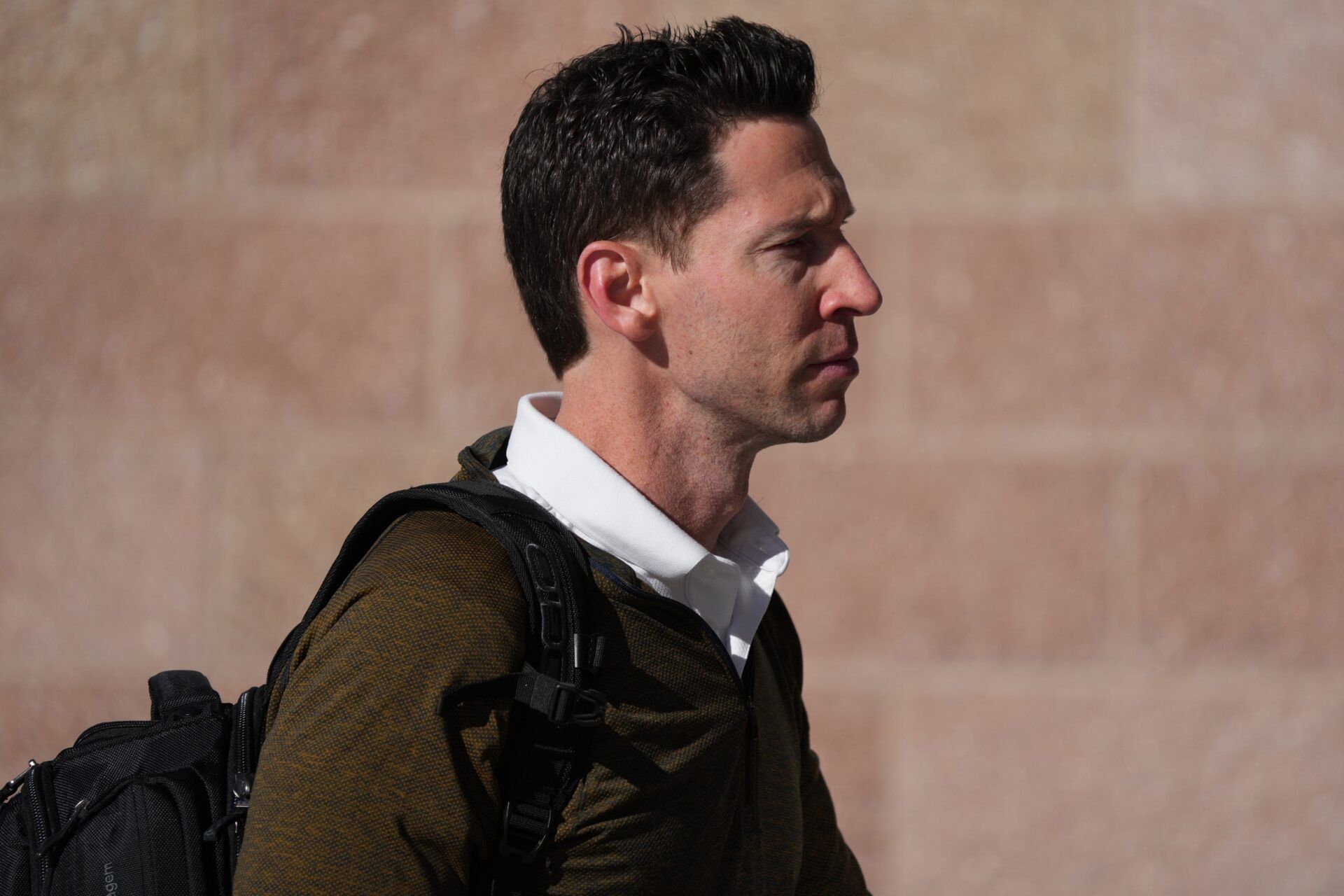 Chicago Cubs assistant general manager Craig Breslow arrives during a spring training workout at Sloan Park.