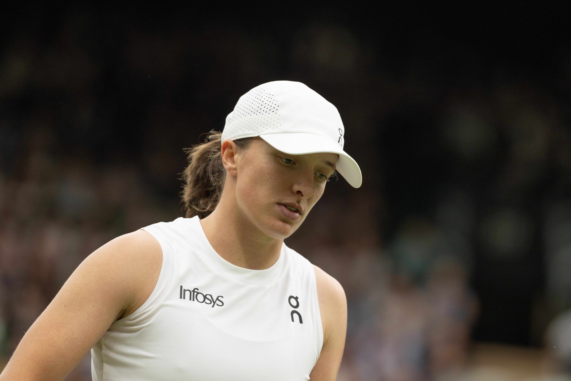 Iga Swiatek of Poland  during her match against Sofia Kenin of the United States on day two of The Championships at All England Lawn Tennis and Croquet Club.